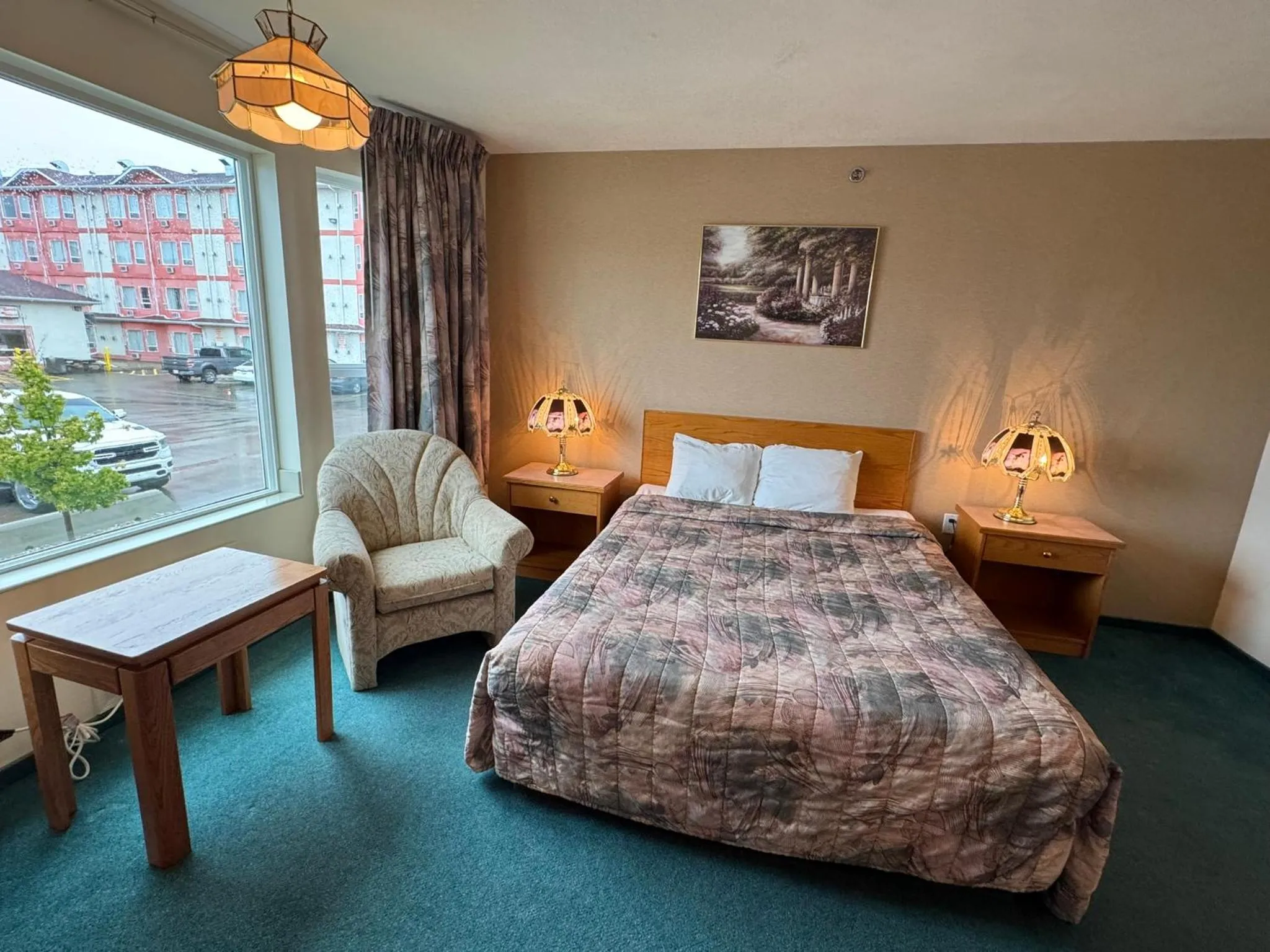 Bed in Western Budget Motel #3 Whitecourt