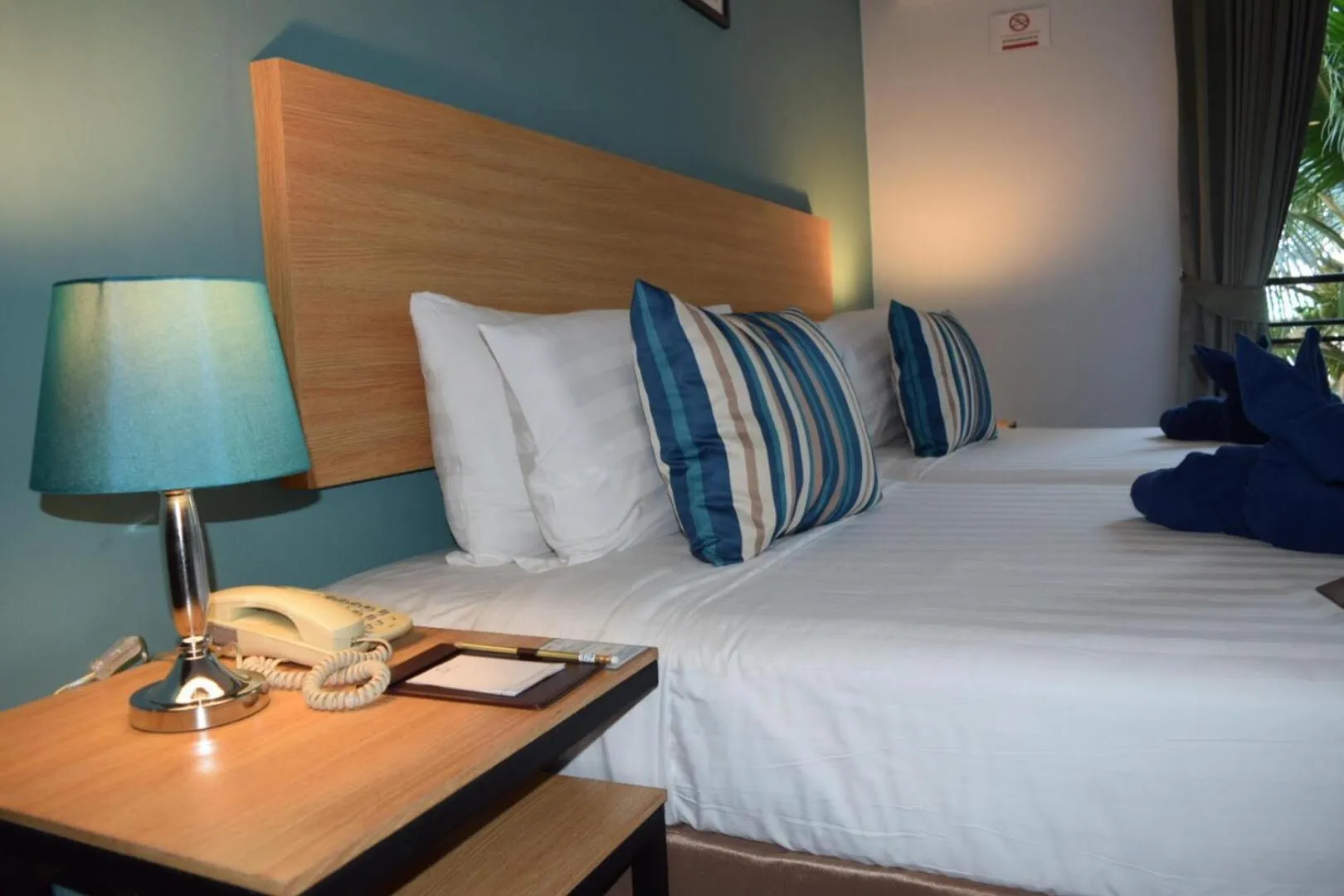 Bed in Vogue Pattaya Hotel