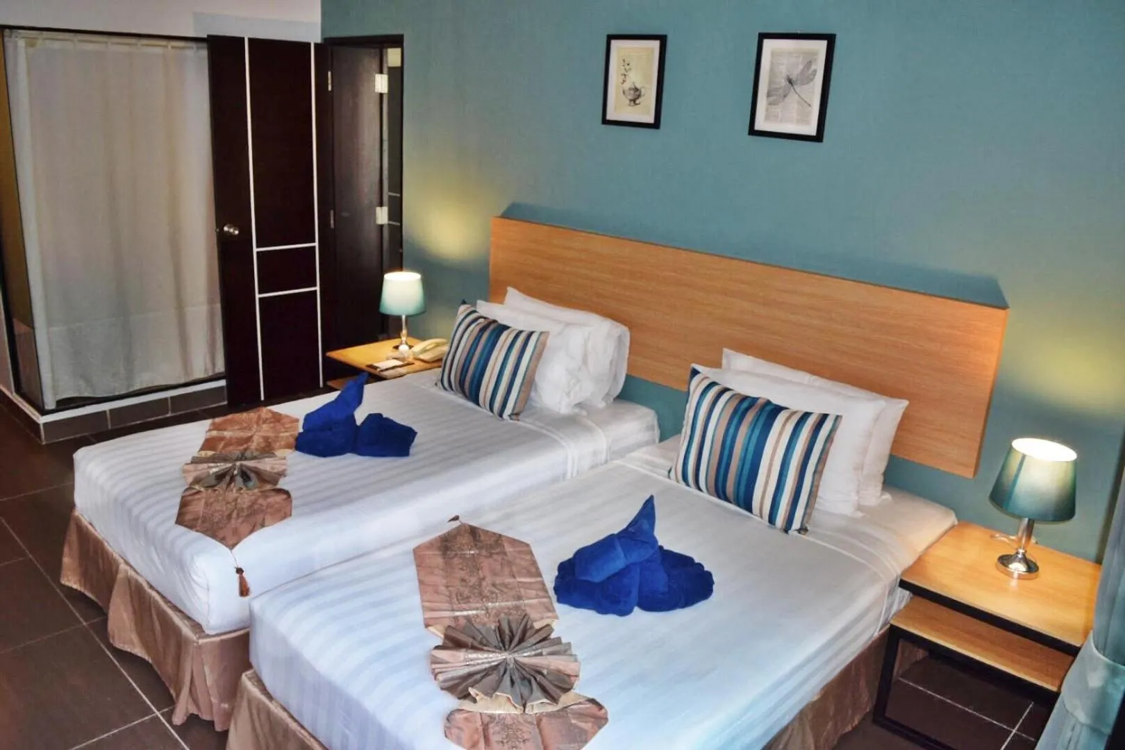 Bed in Vogue Pattaya Hotel