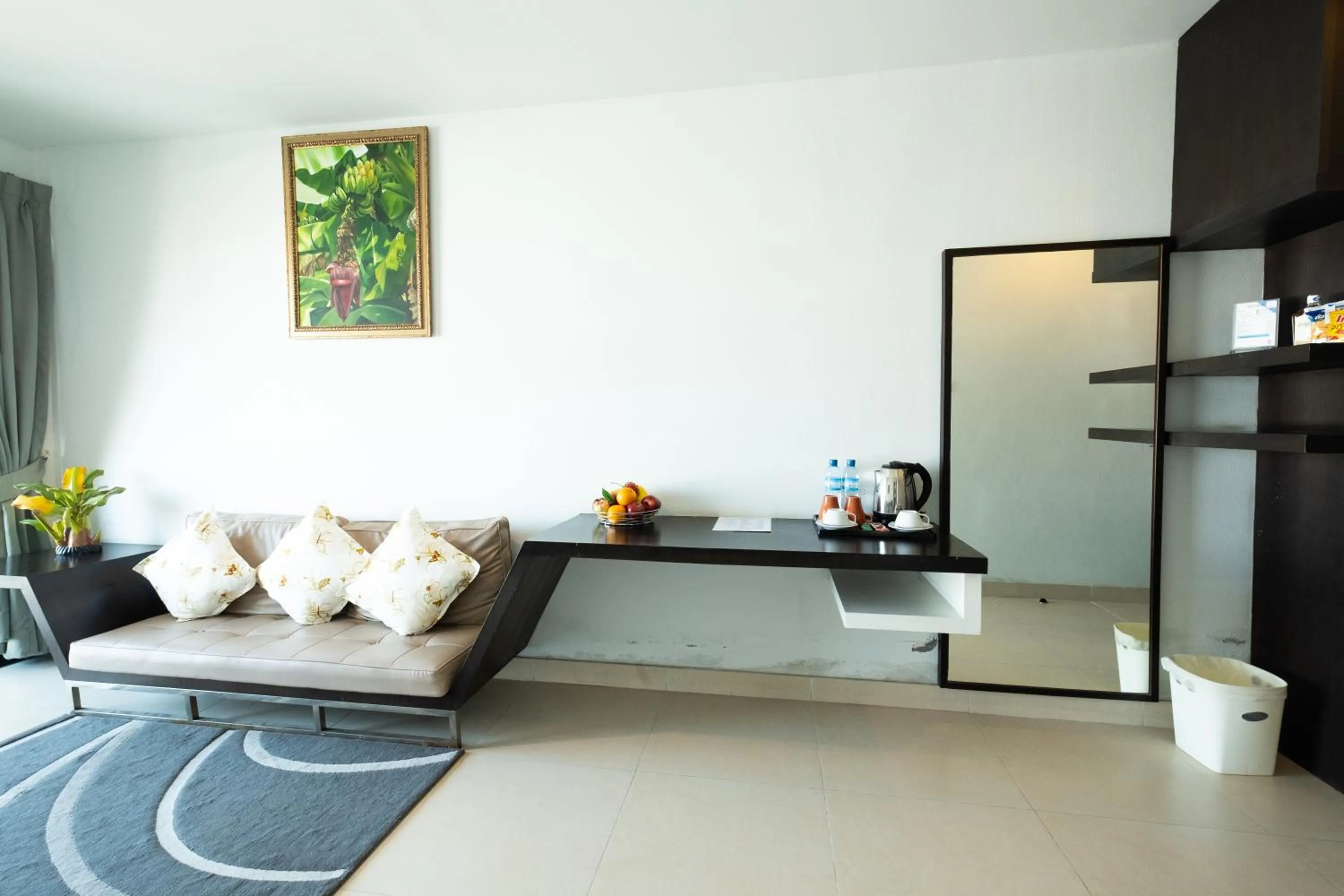 Living room in Vogue Pattaya Hotel