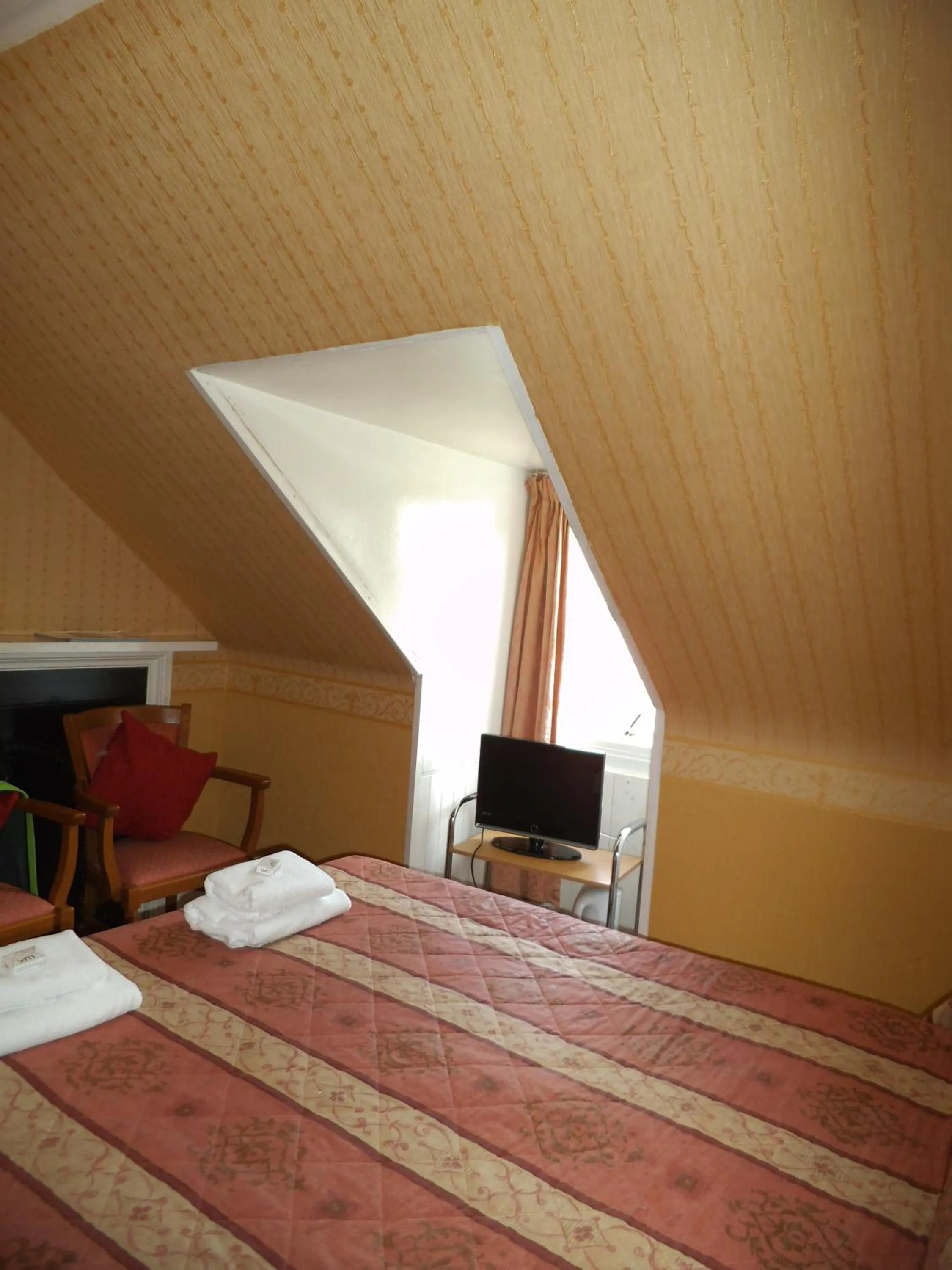 Bed in Menzies Guest House