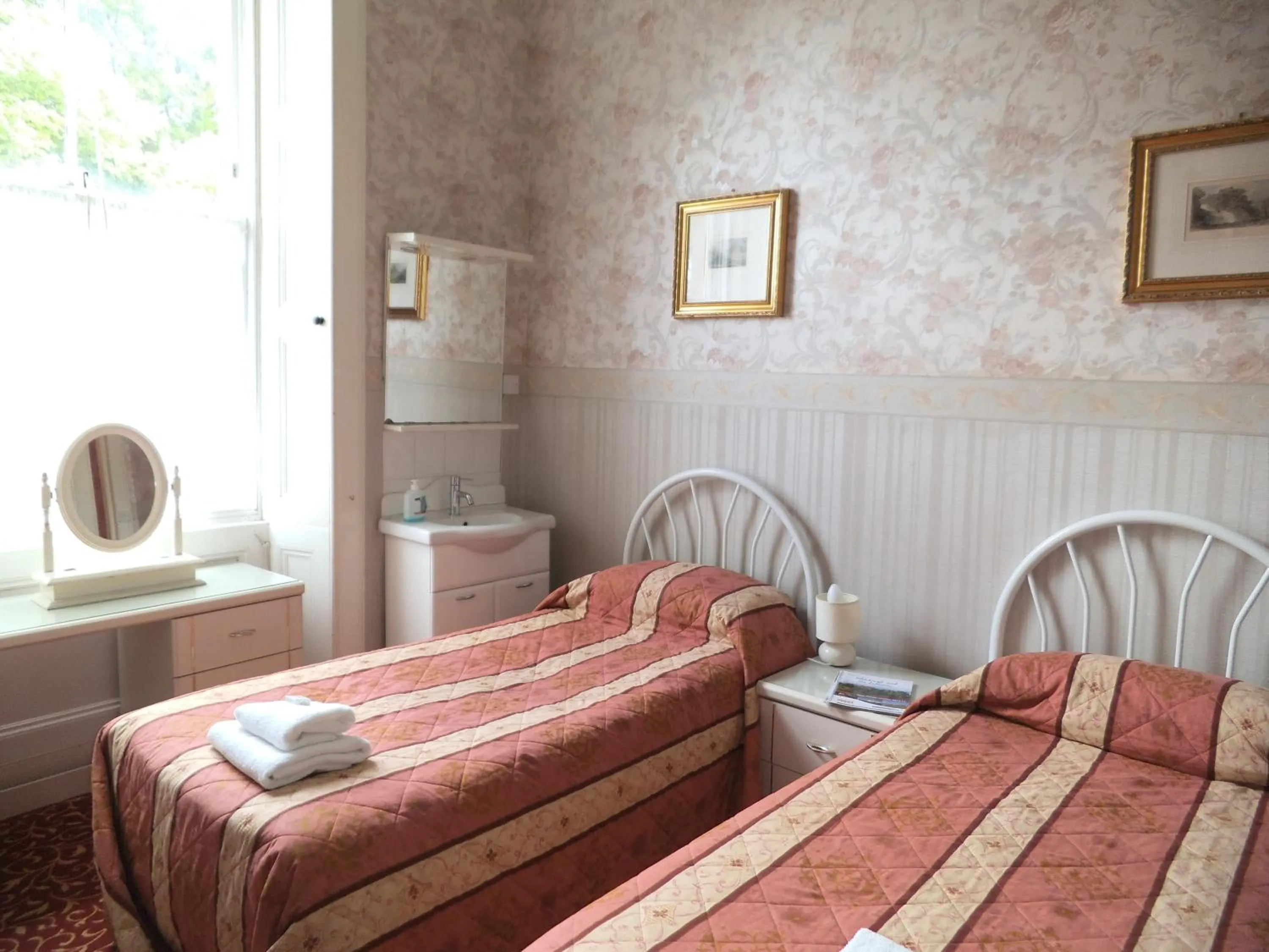 Bed in Menzies Guest House