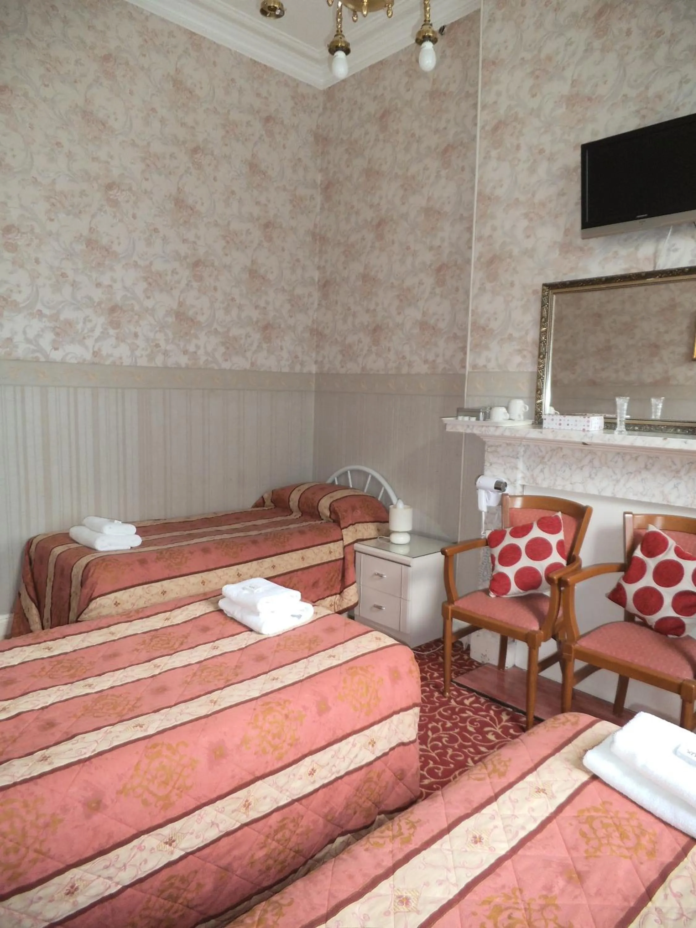 Bed in Menzies Guest House