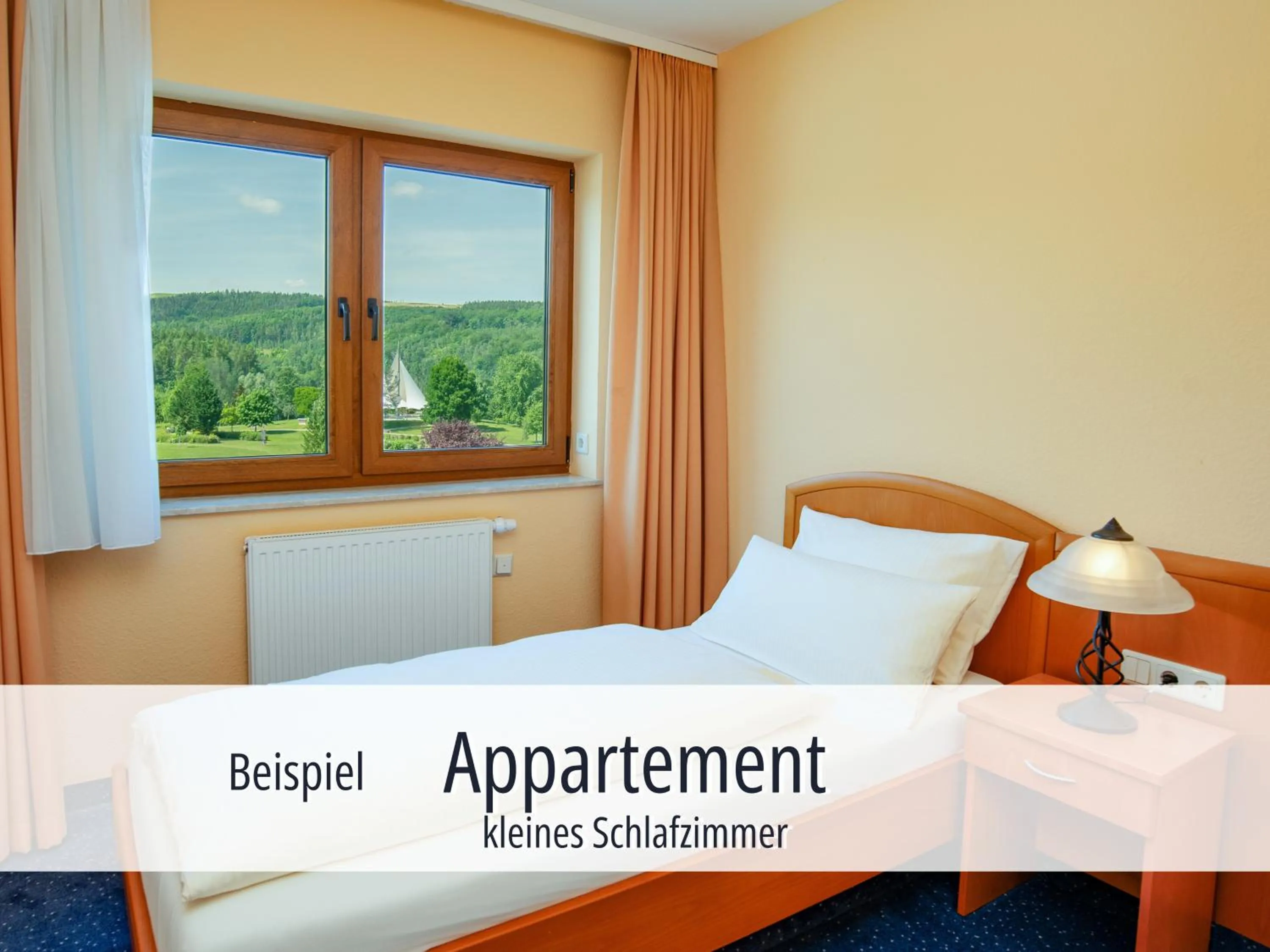 Bed in Hotel Am Kurhaus mit erstem Ayurveda Center Sachsens - direkt am Gesundheitsbad ACTINON & Kurpark