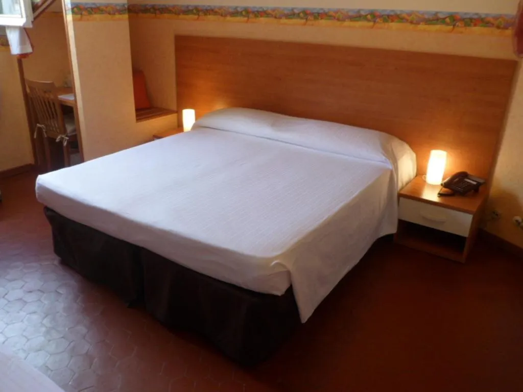 Bed in Hotel Liberty