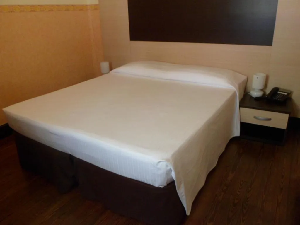 Bed in Hotel Liberty