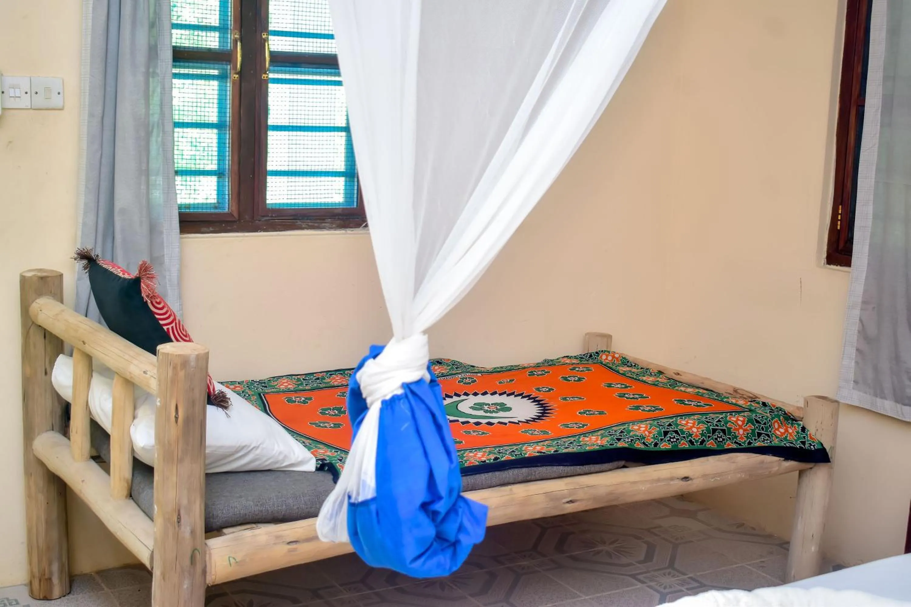 Bed in Blue Earth Beach Bungalow