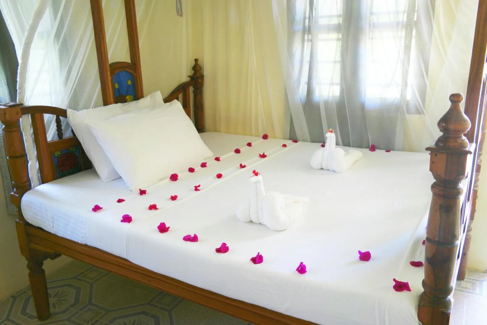 Bed in Blue Earth Beach Bungalow