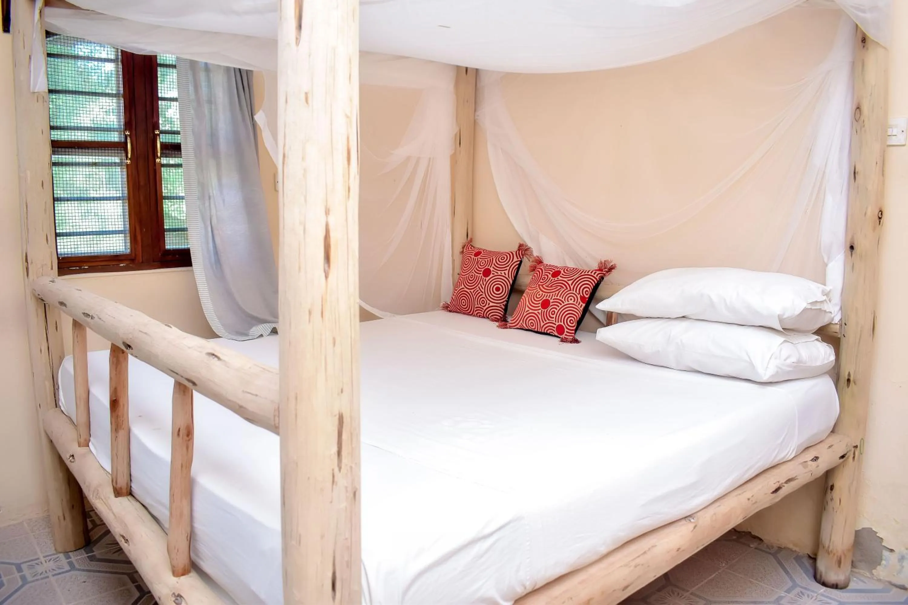 Bed in Blue Earth Beach Bungalow