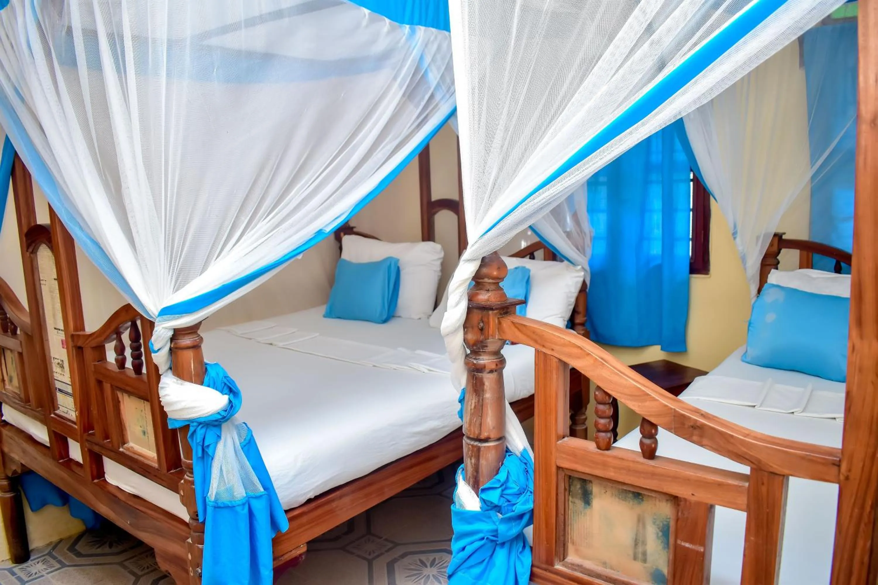 Bed in Blue Earth Beach Bungalow
