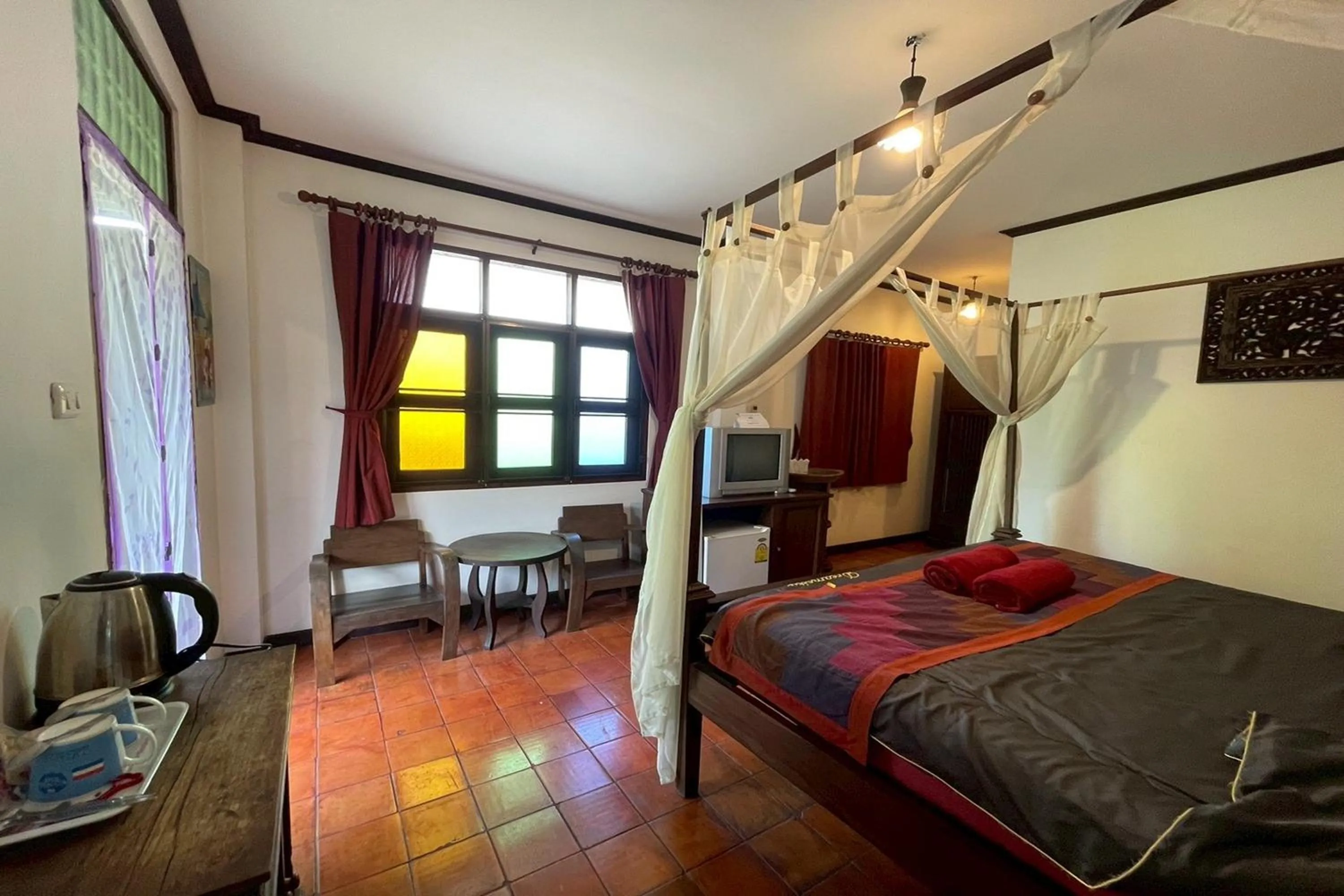 Bed in The Royal Shilton Resort