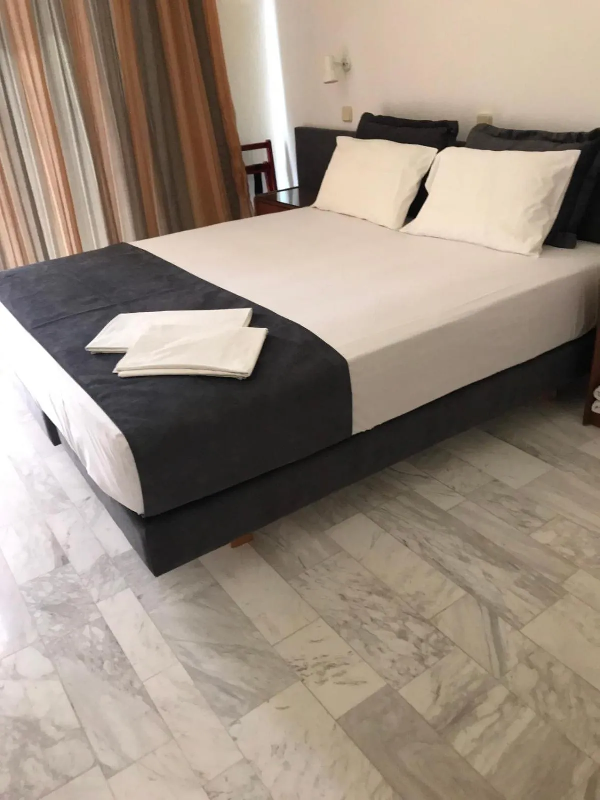 Bed in Vlycha Beach Apartments