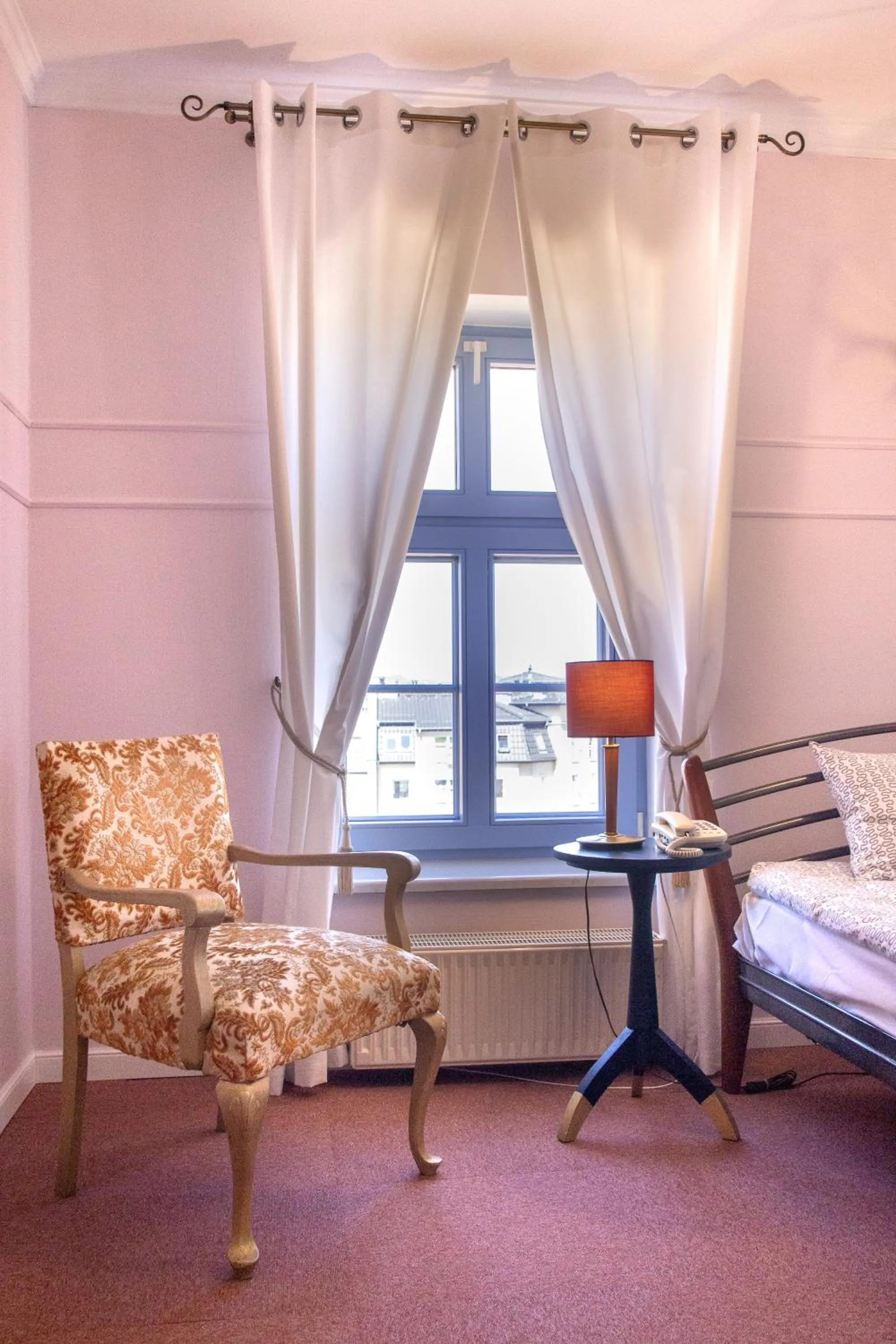 Seating area, Bed in Hotel Marmułowski