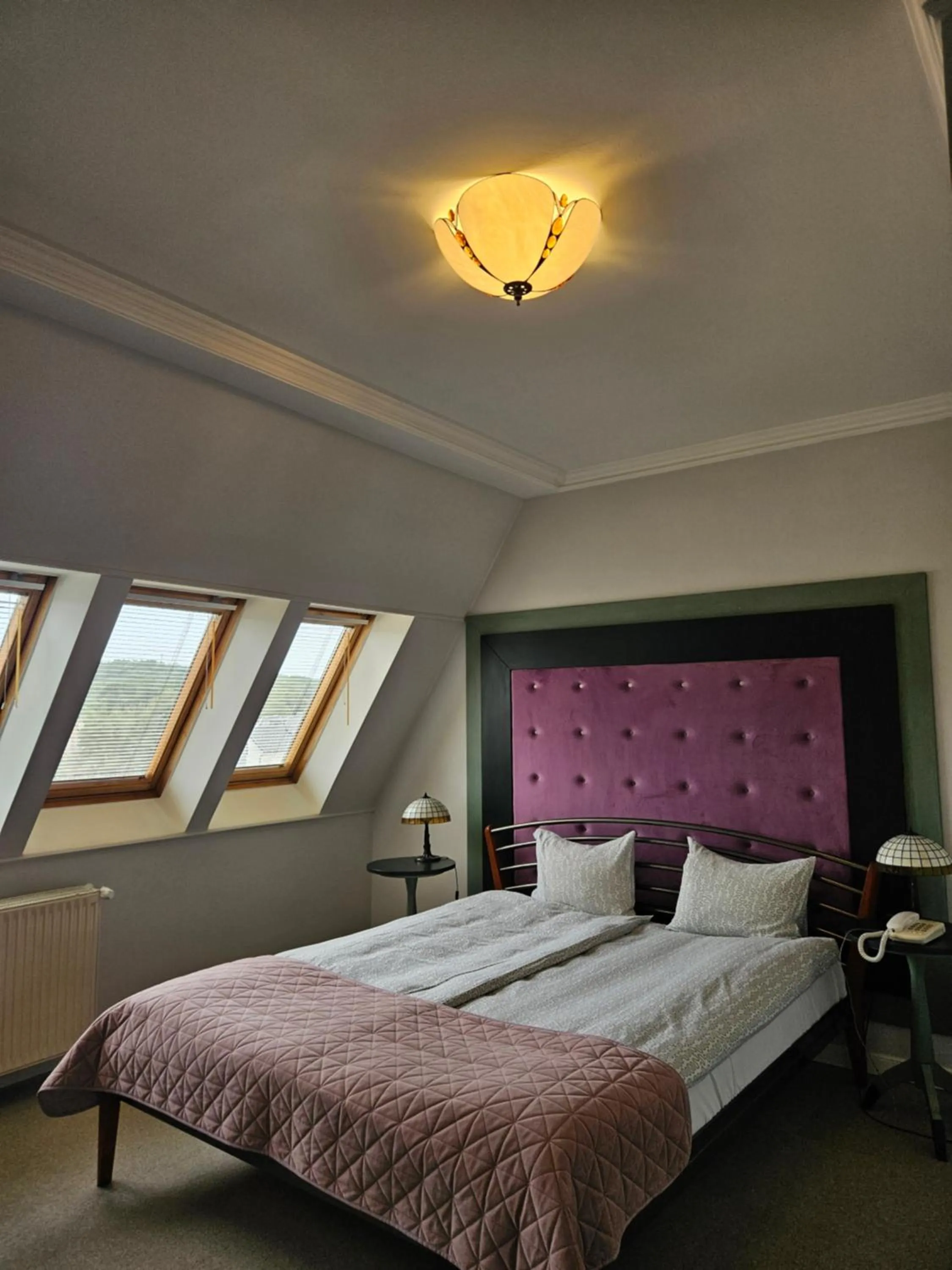 Bed in Hotel Marmułowski