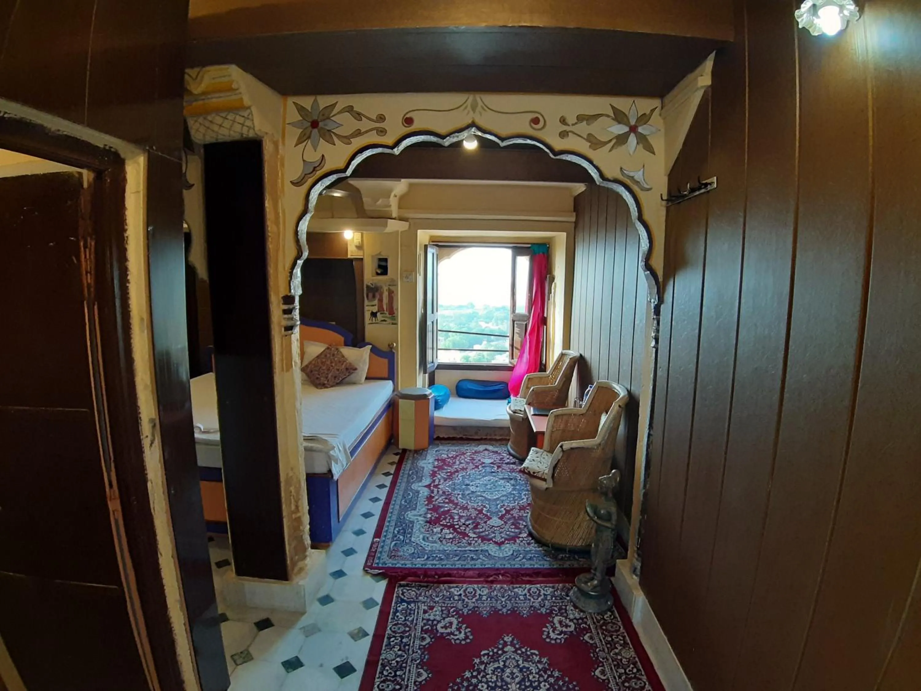 Seating area, Bed in Hotel Paradise