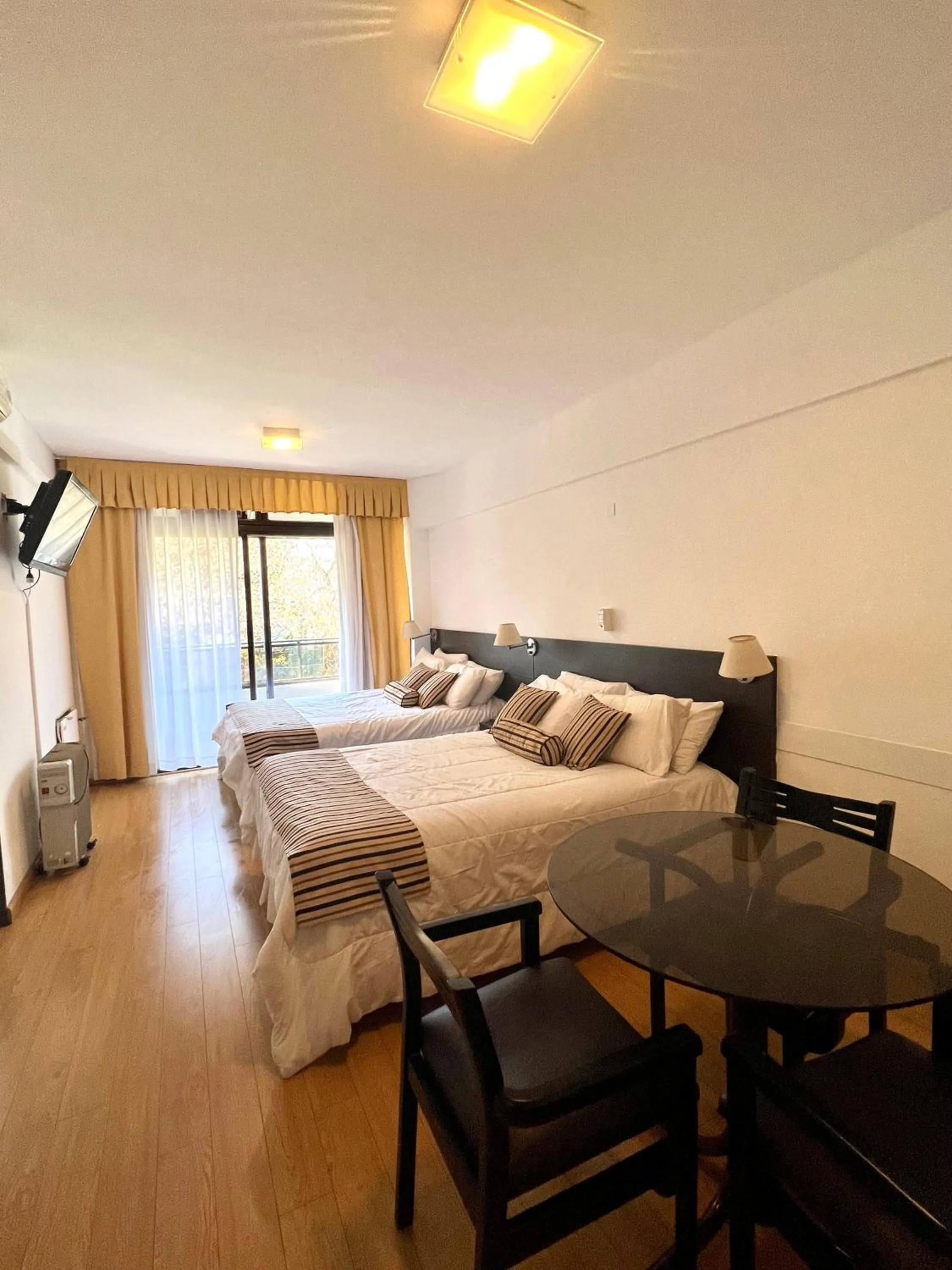 Bed in Golf Tower Suites & Apartments