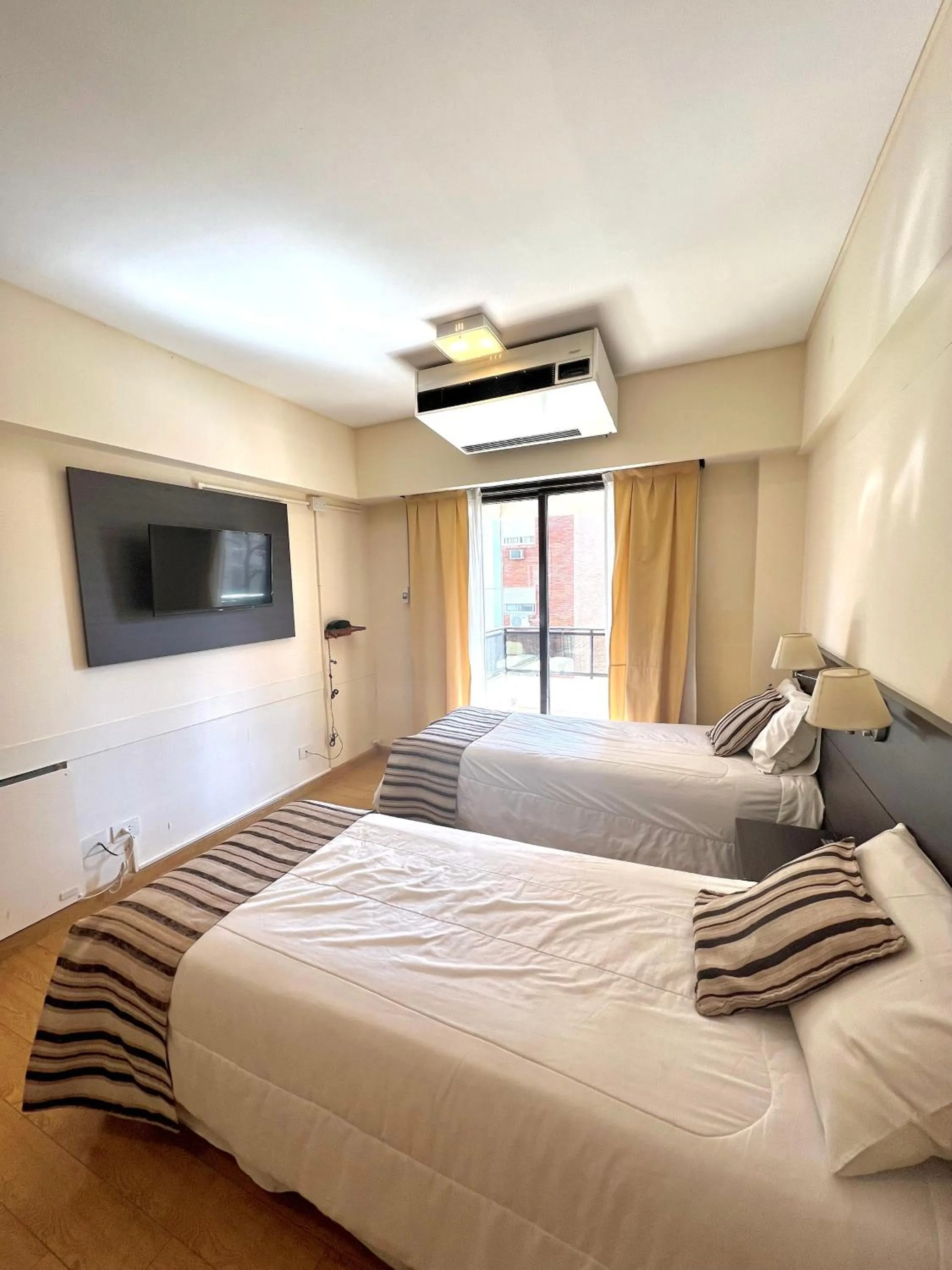 Bed in Golf Tower Suites & Apartments