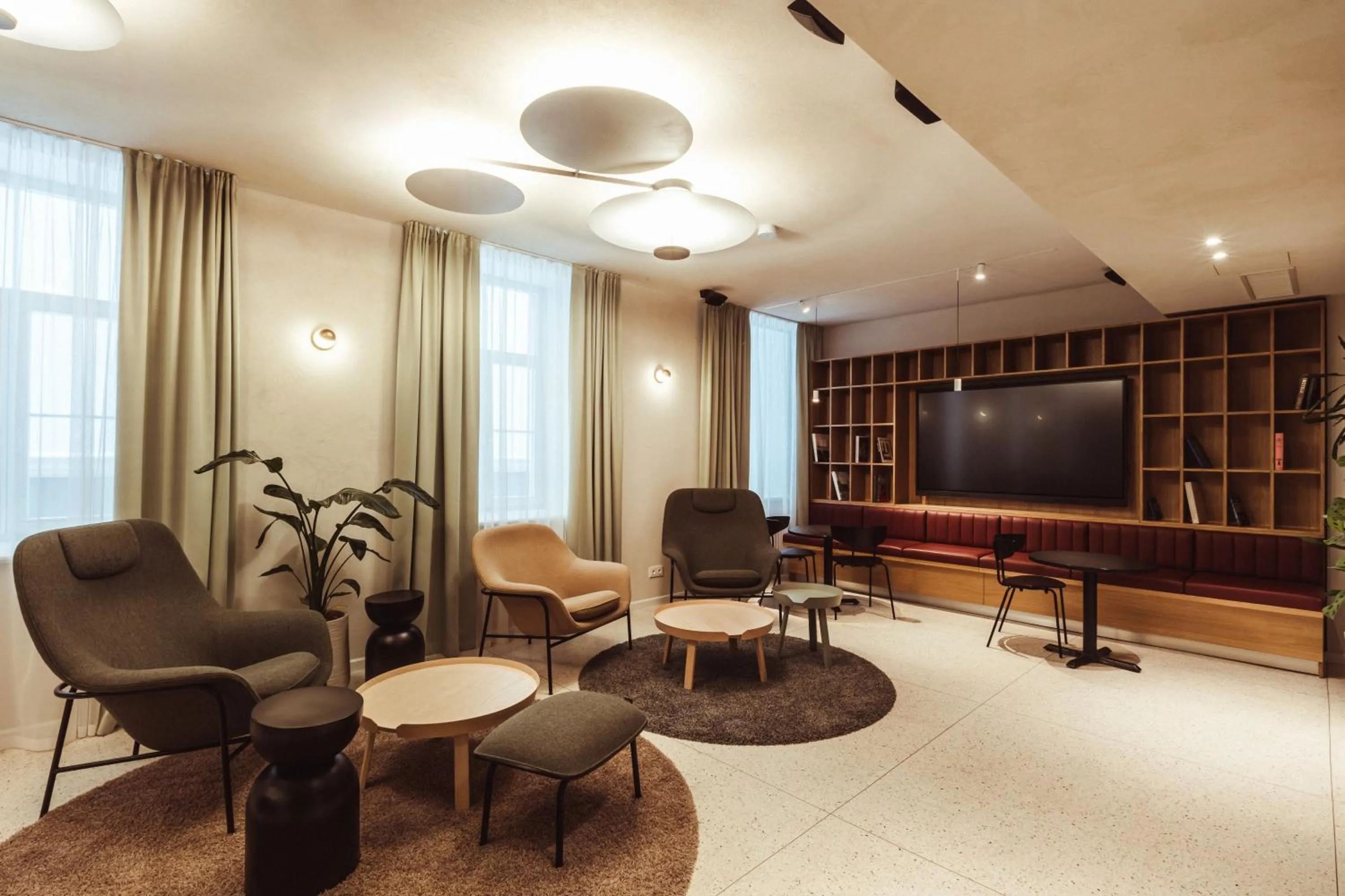 Communal lounge/ TV room in Konventa Sēta Hotel - Keystone Collection