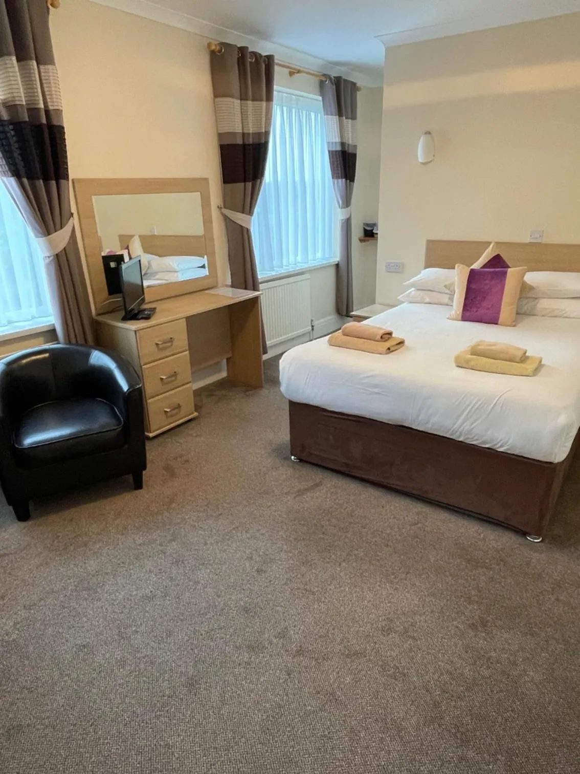 Bed in Merlewood Hotel