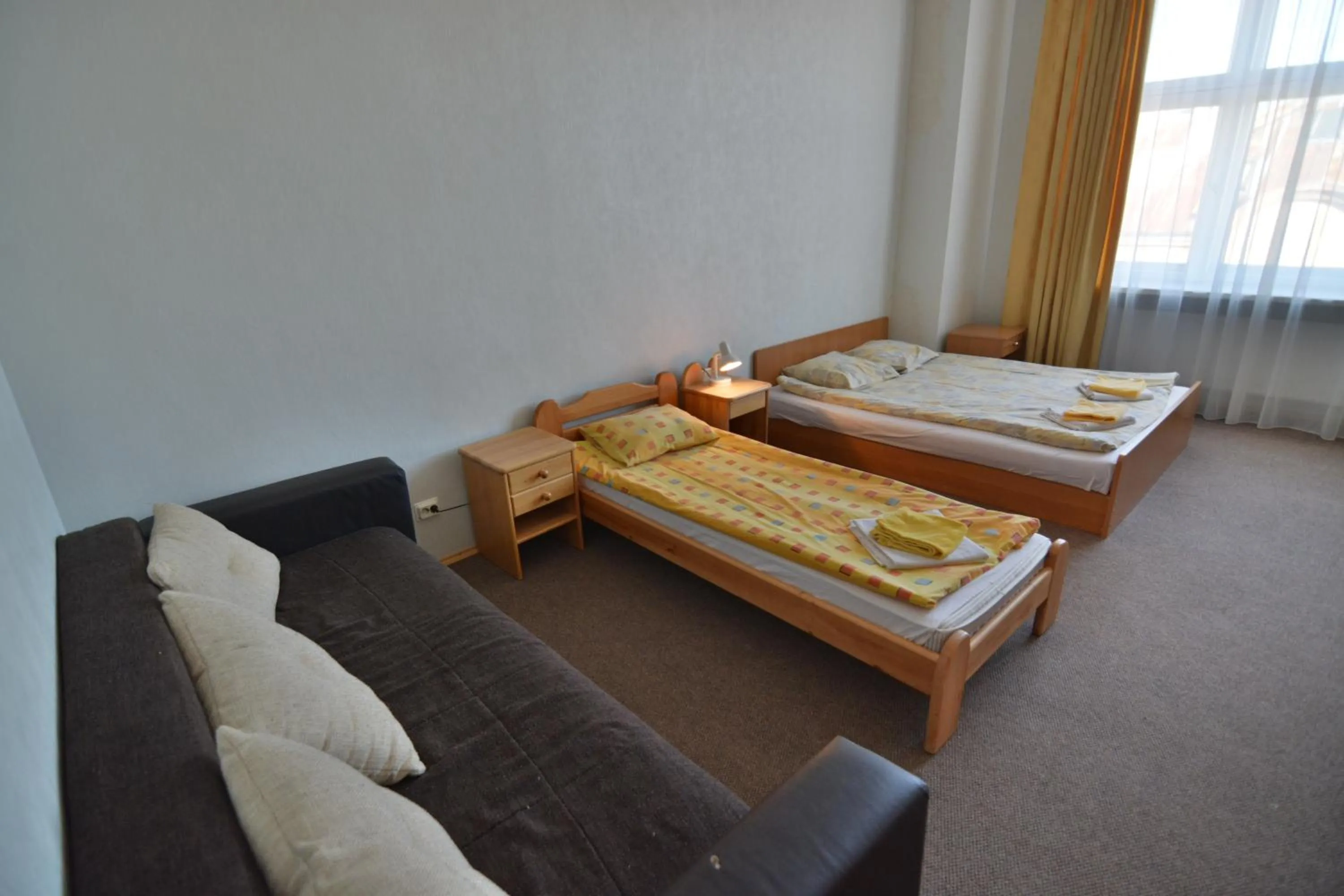 Photo of the whole room, Bed in Hotel Multilux with Self Check-in