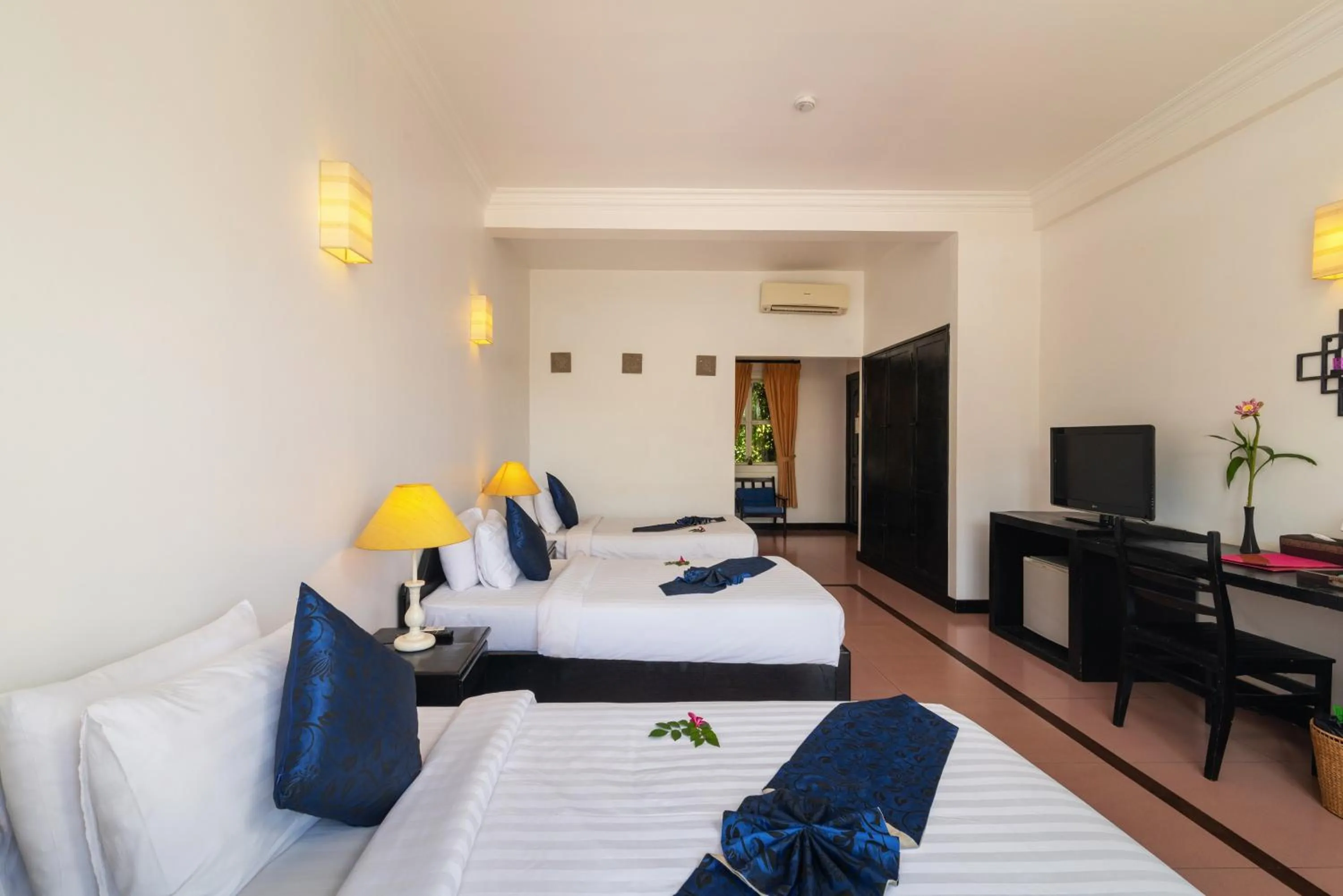 Bed in Amber Angkor Villa Hotel & Spa