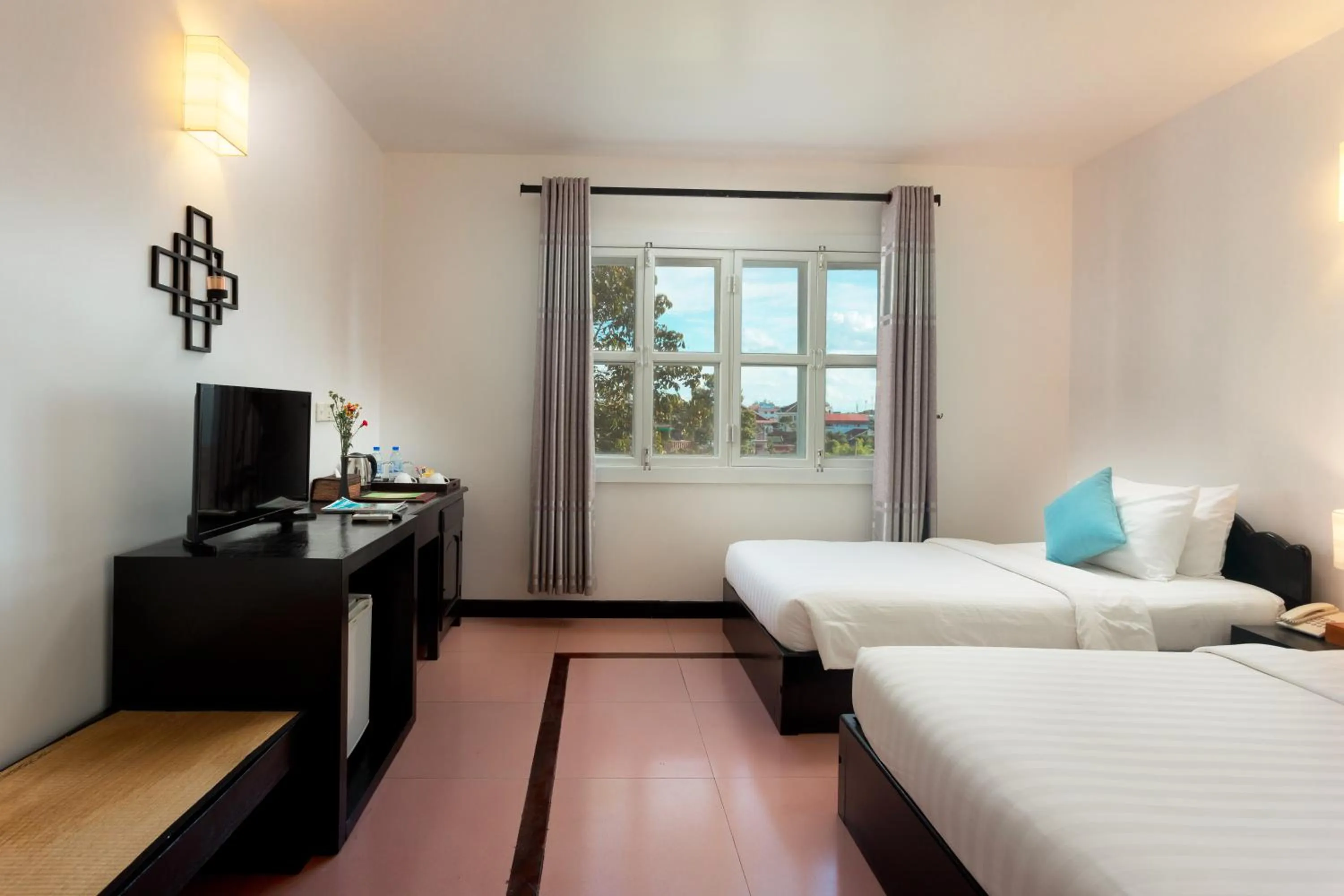 Bed in Amber Angkor Villa Hotel & Spa