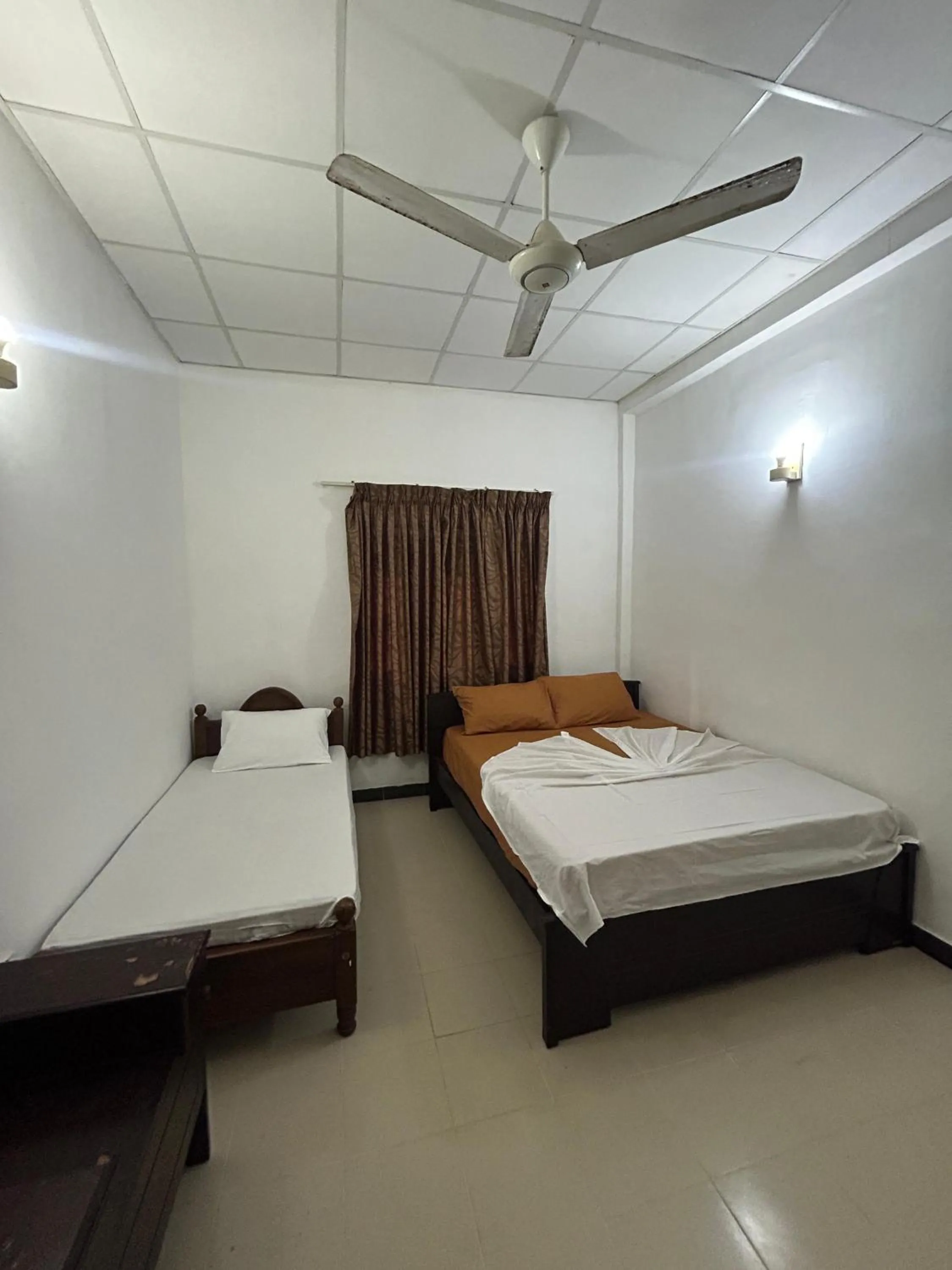 Budget Triple Room - single occupancy in Himo Guest Inn