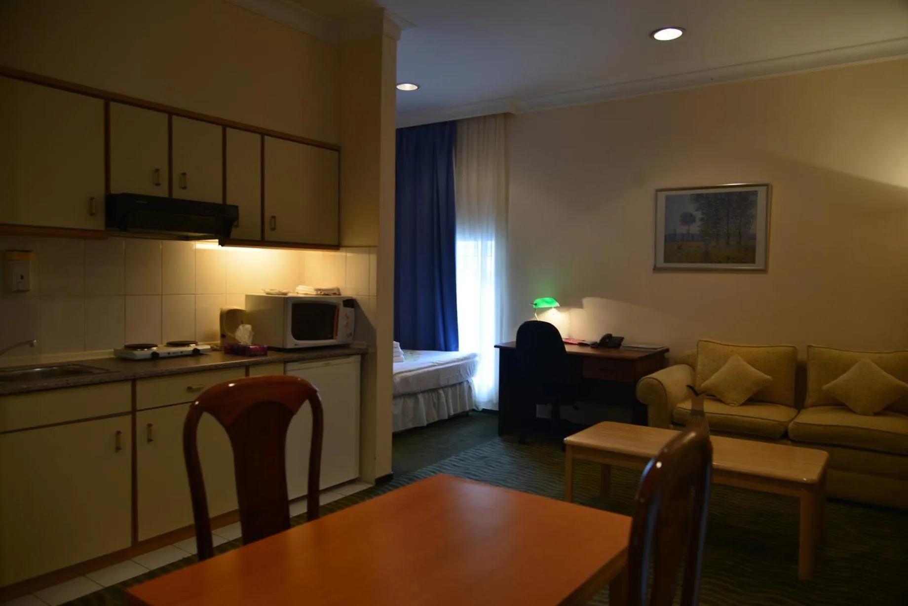 Kitchen or kitchenette in City Mansion ApartHotel