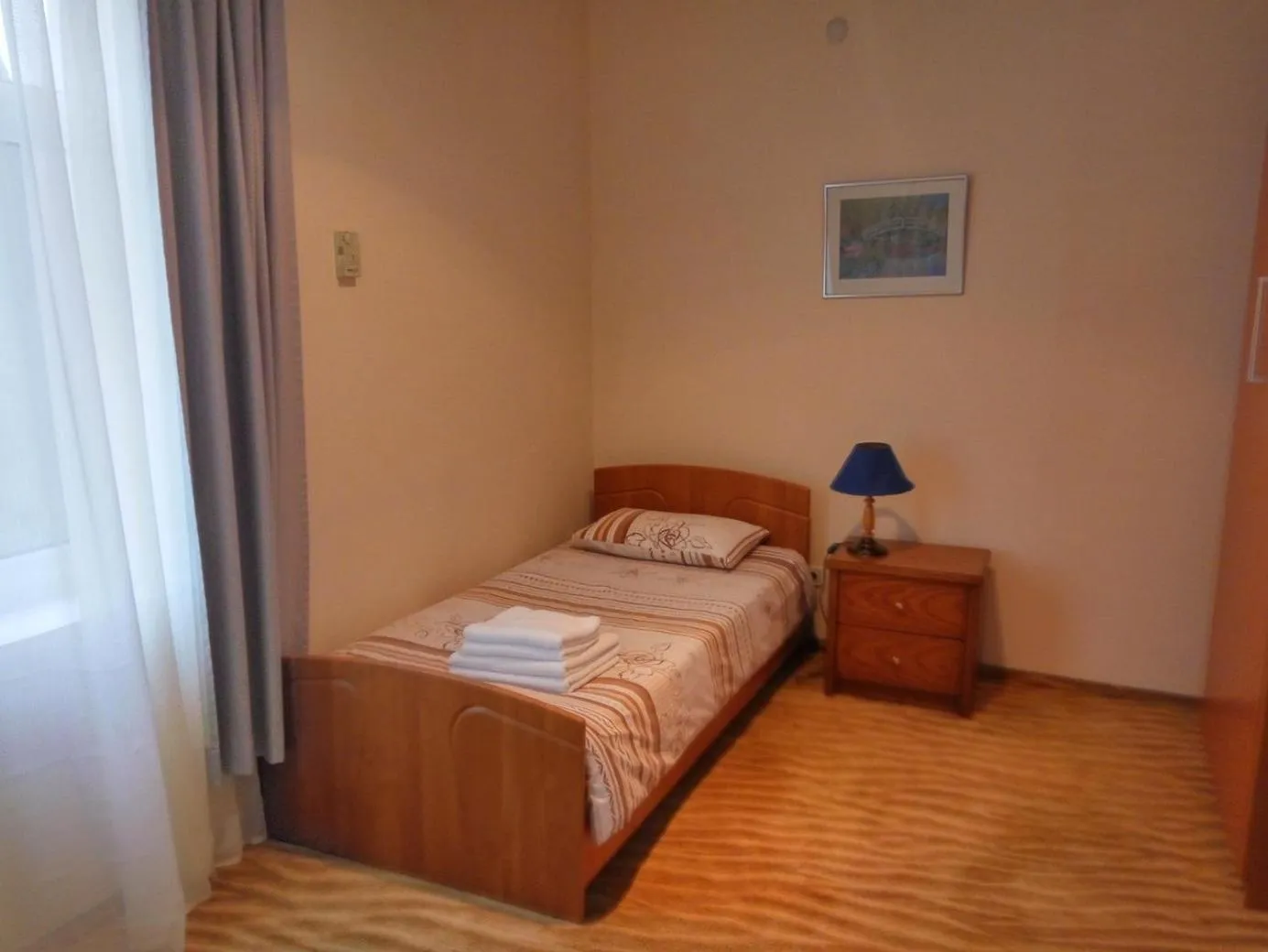 Bed in City Mansion ApartHotel