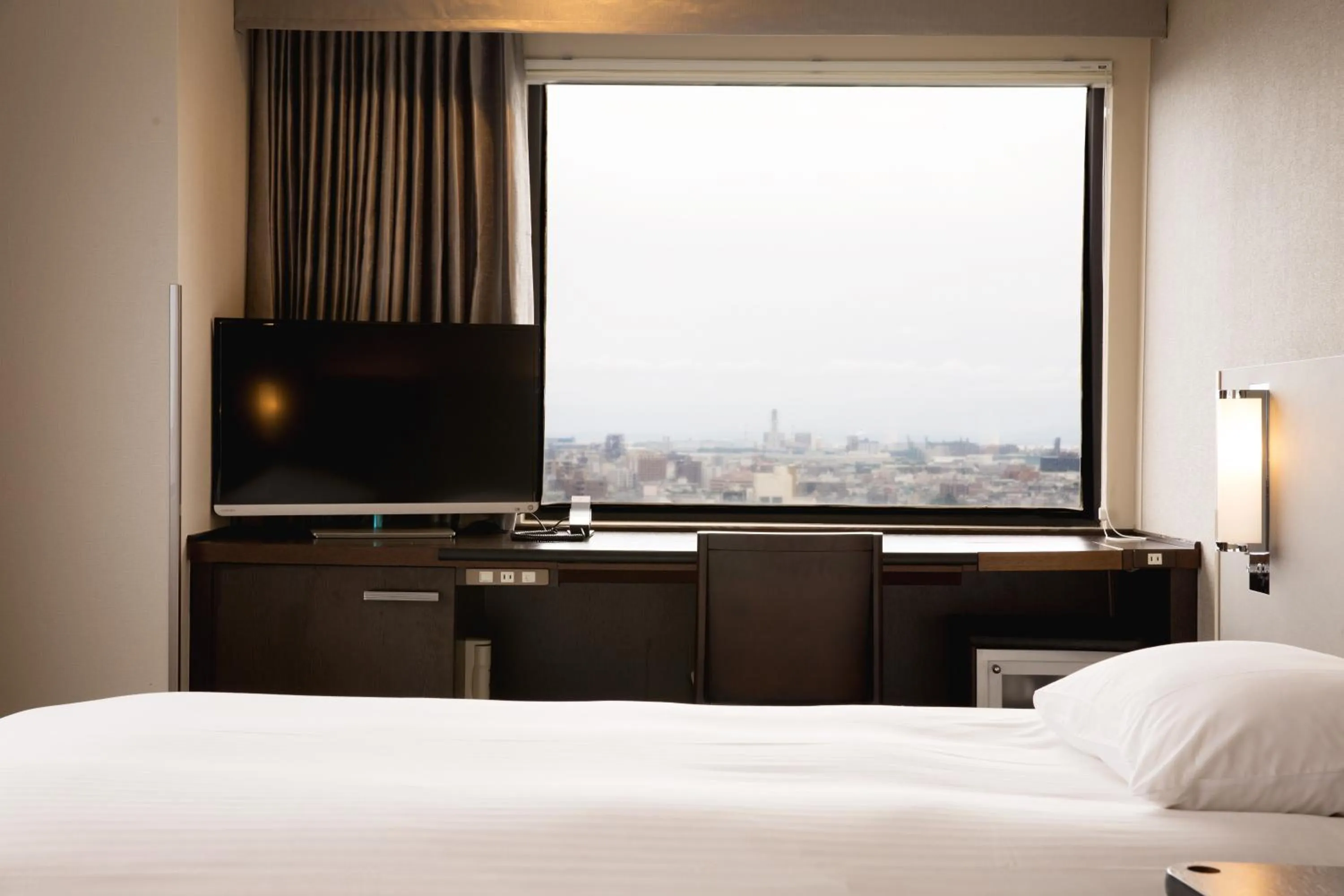 Bed in Kawasaki Nikko Hotel