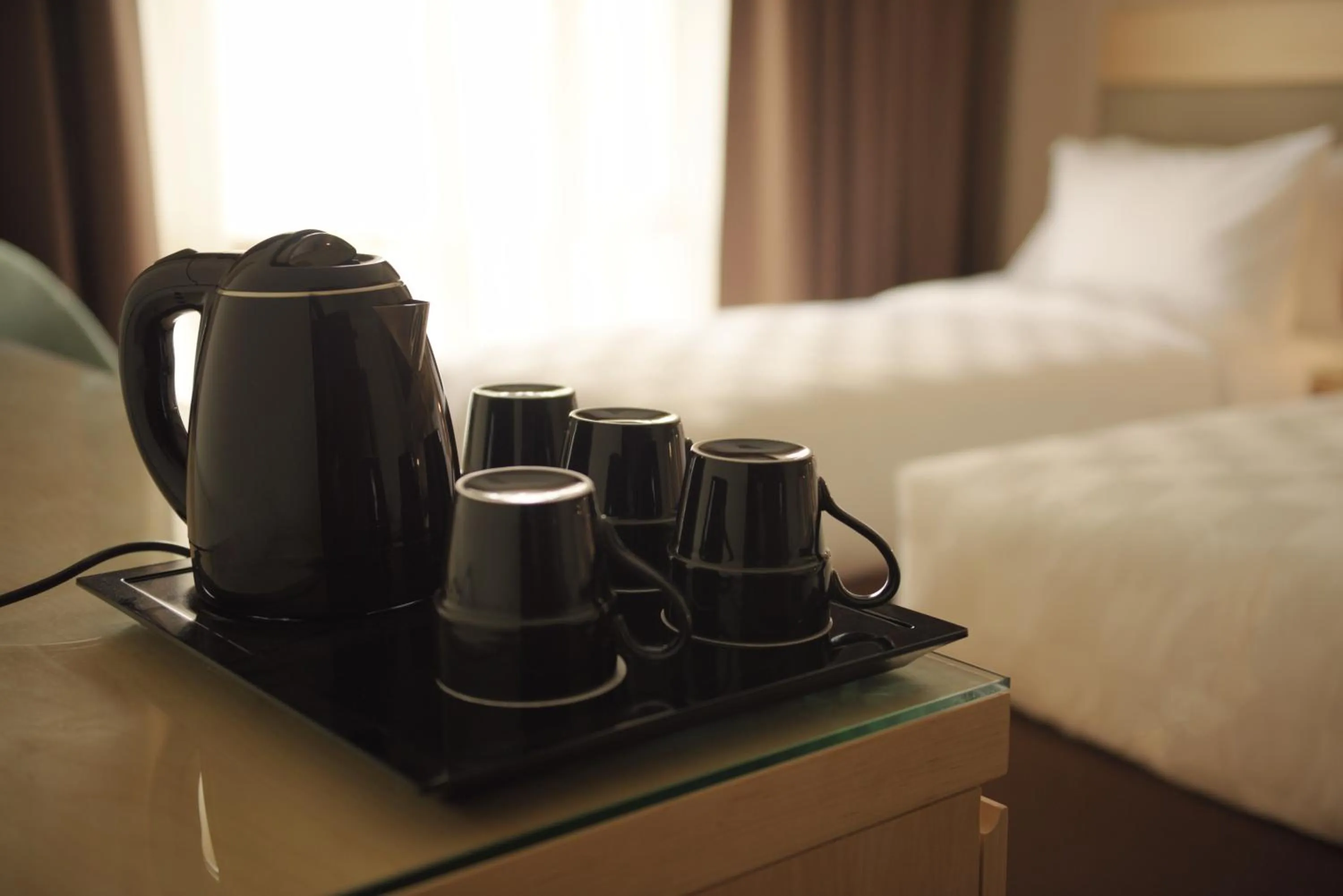Coffee/tea facilities, Bed in SAJA By Warwick Madinah Hotel