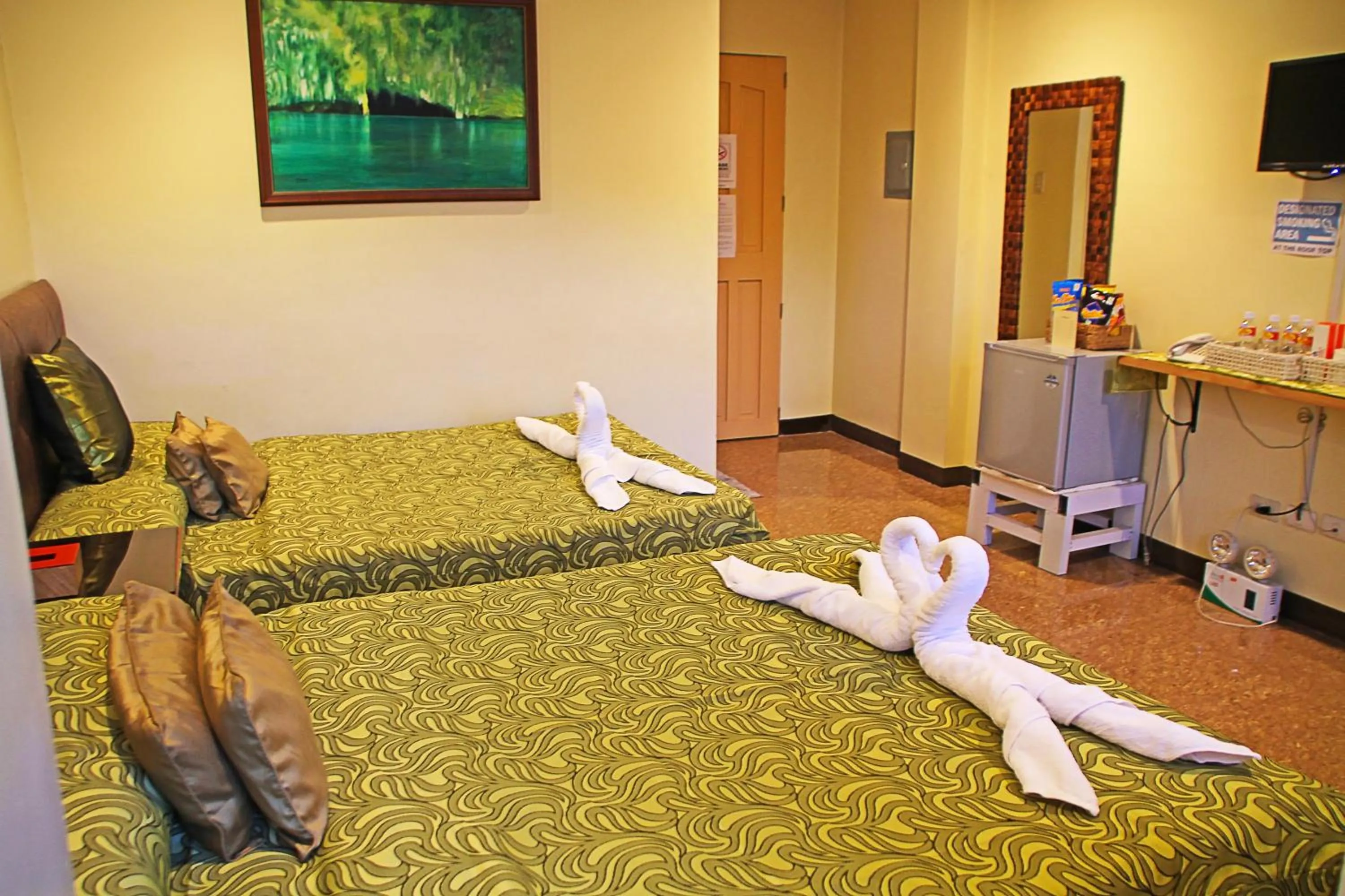 Bed in Fj Manila Hotel