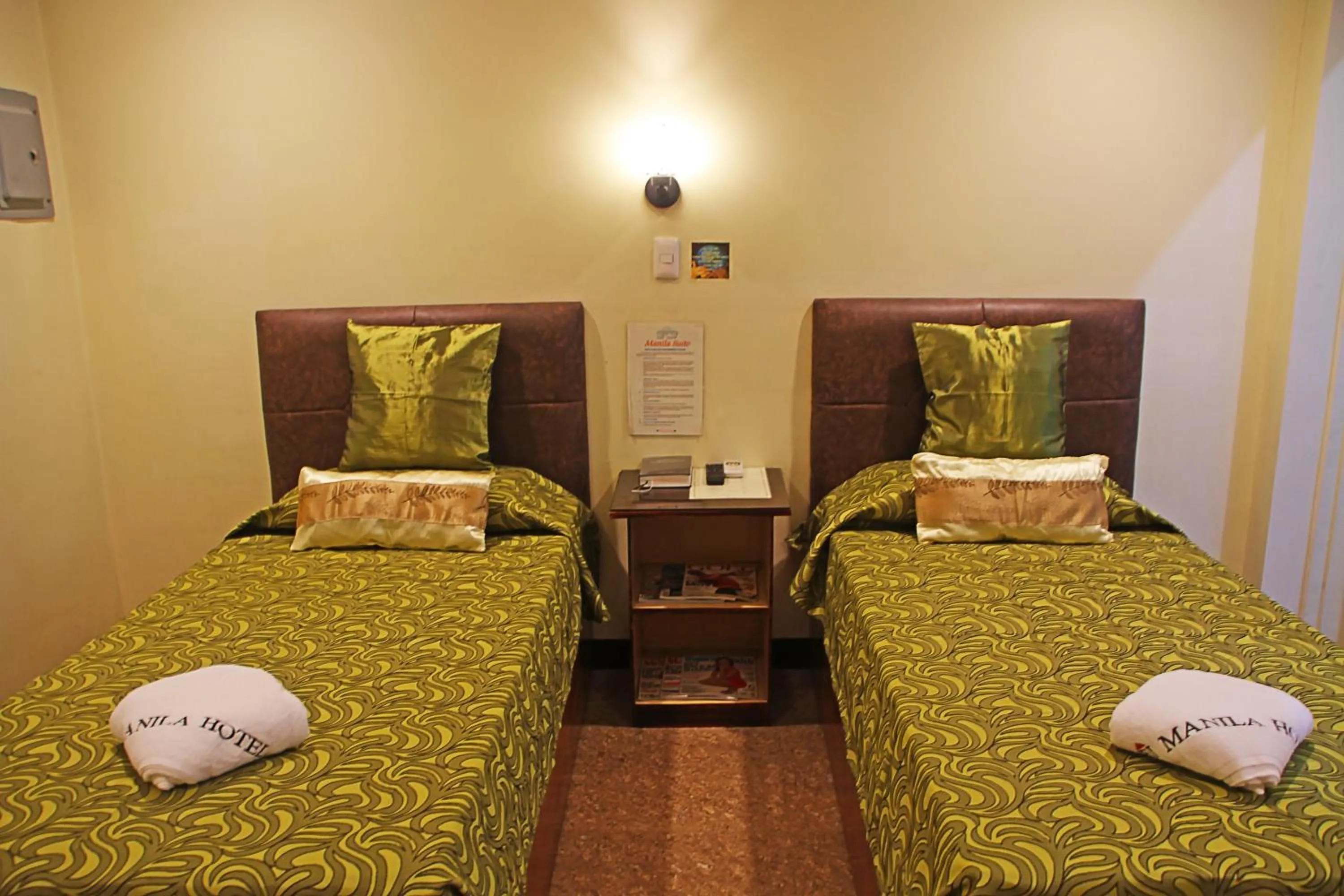 Bed in Fj Manila Hotel