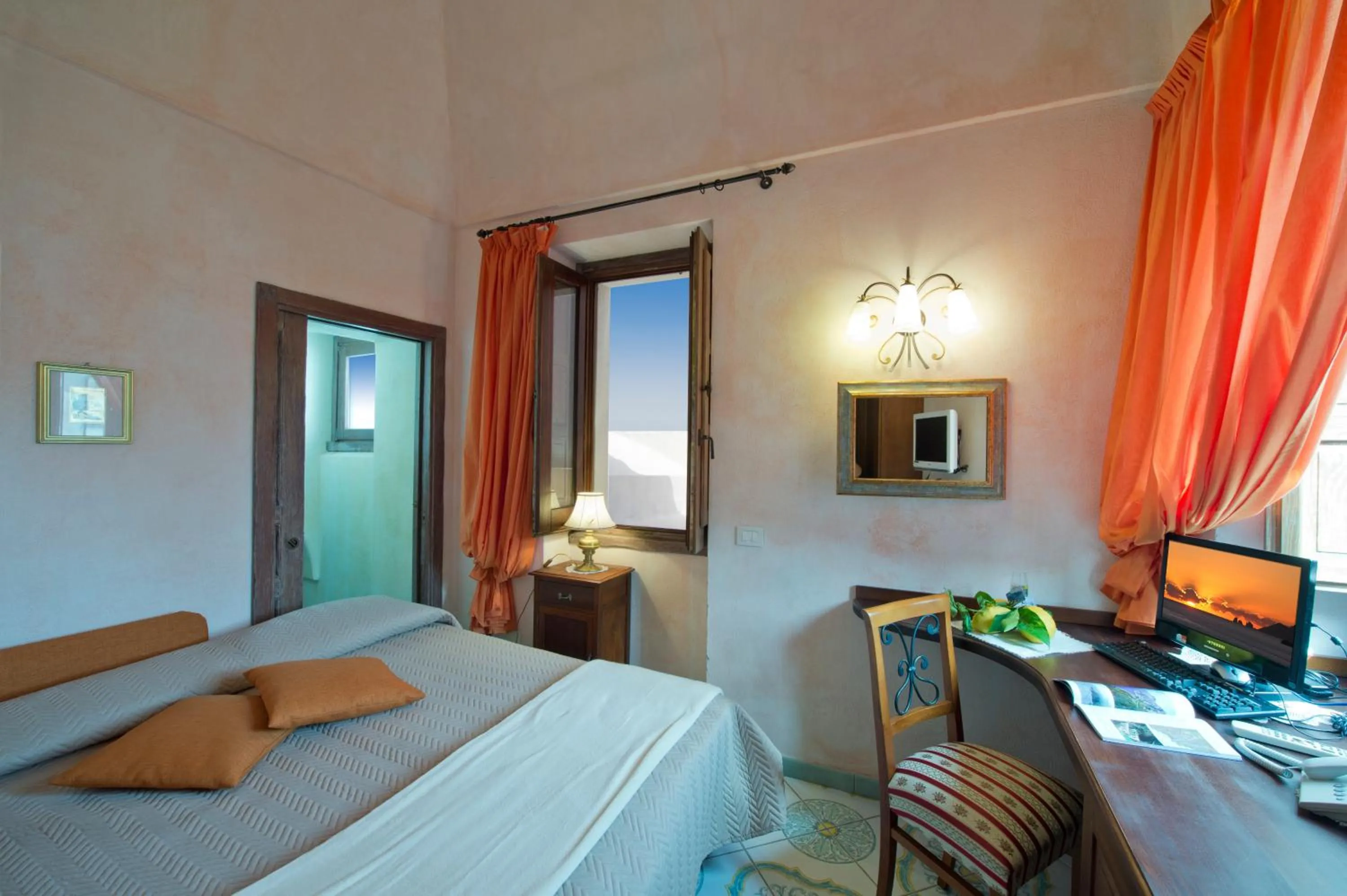 Photo of the whole room, Bed in L'Antico Borgo Dei Limoni