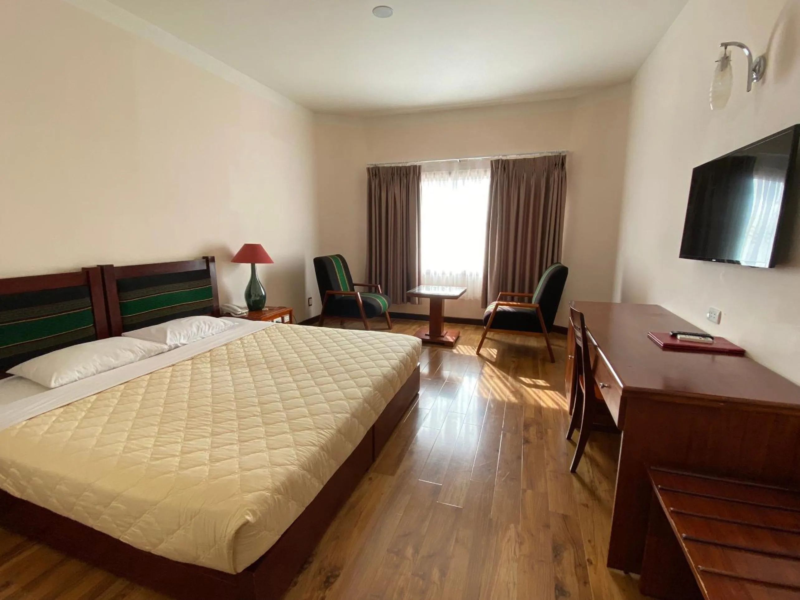 Bed in Dam San Hotel