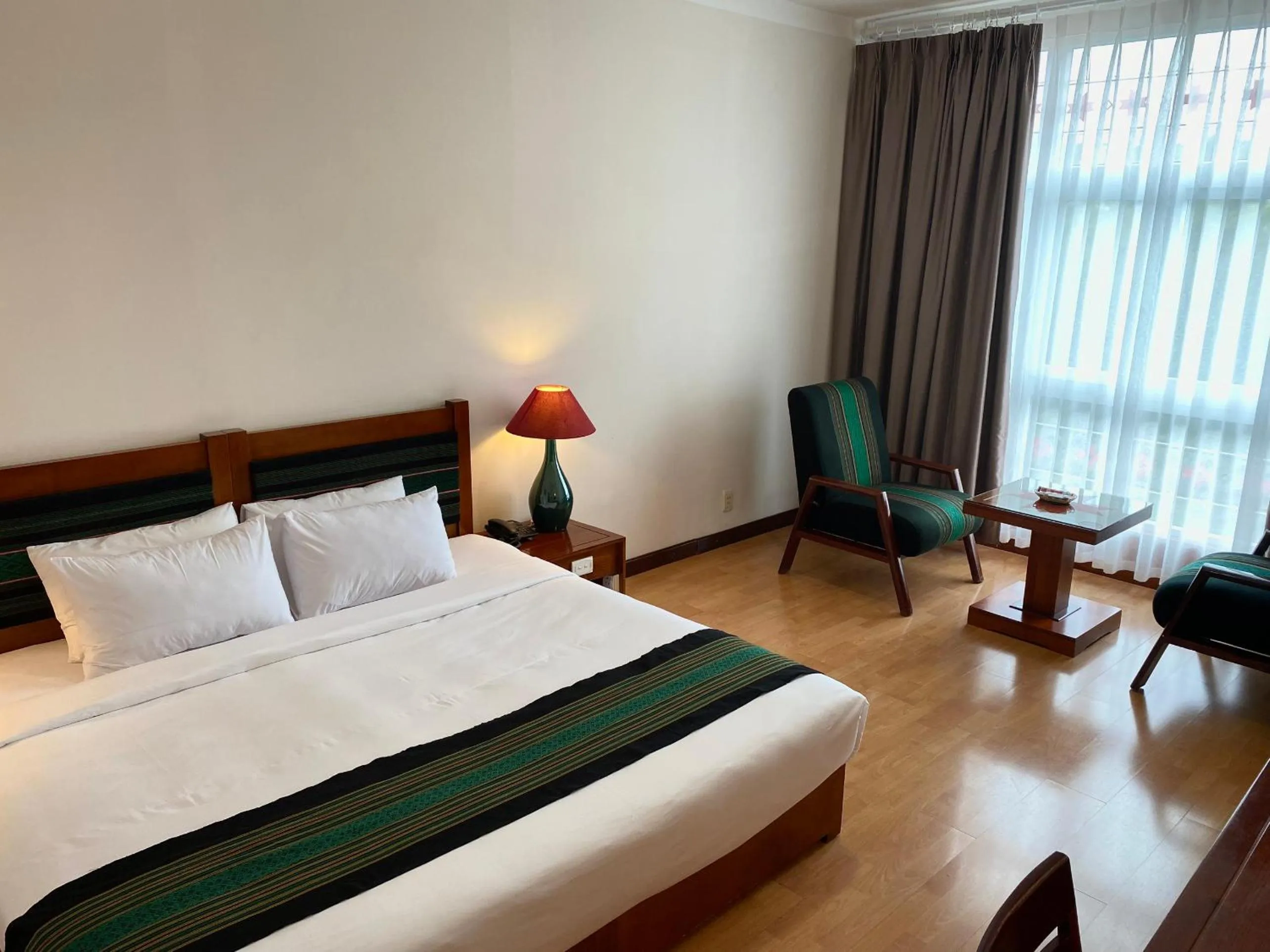 Bed in Dam San Hotel