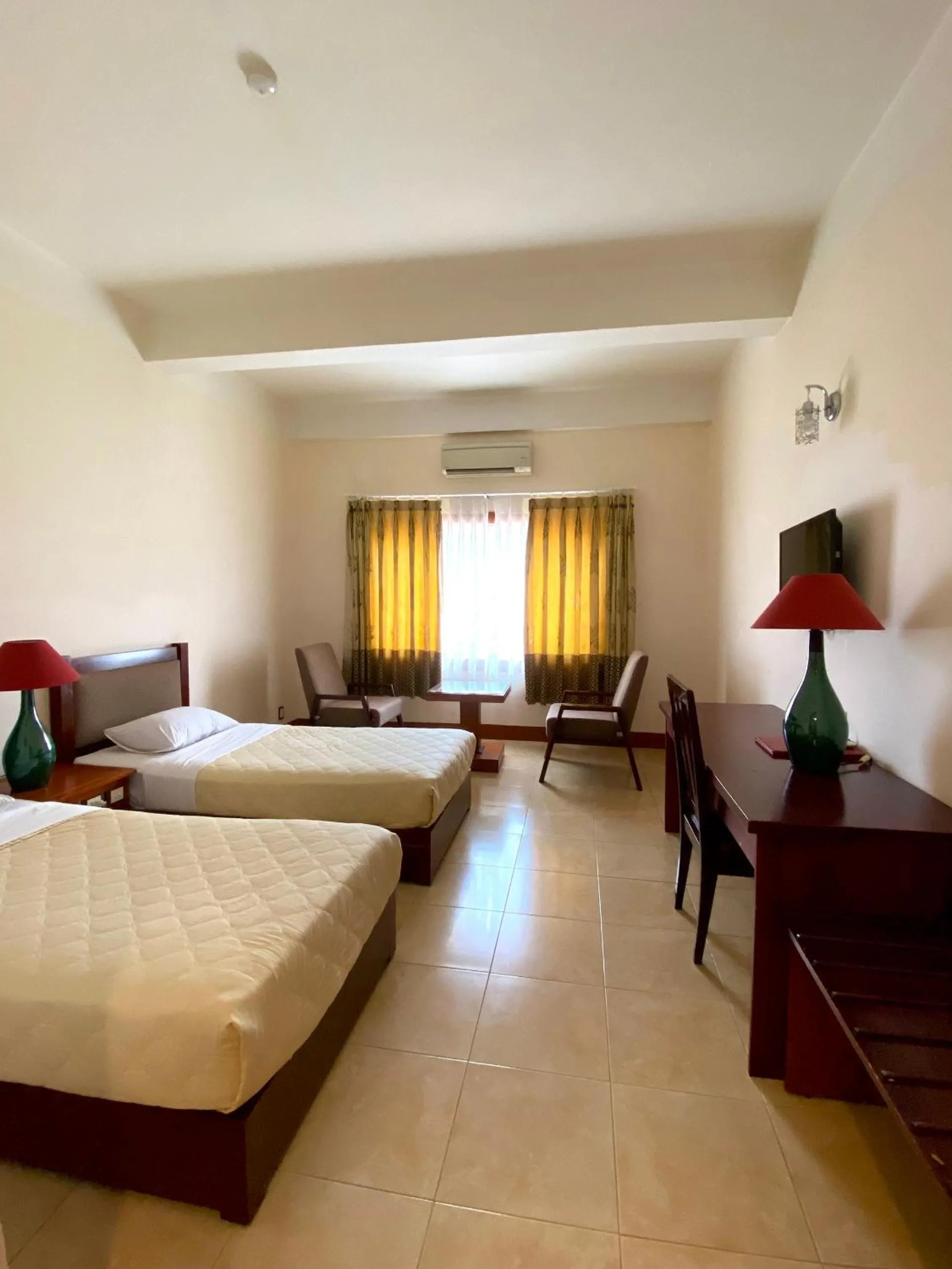 Bed in Dam San Hotel