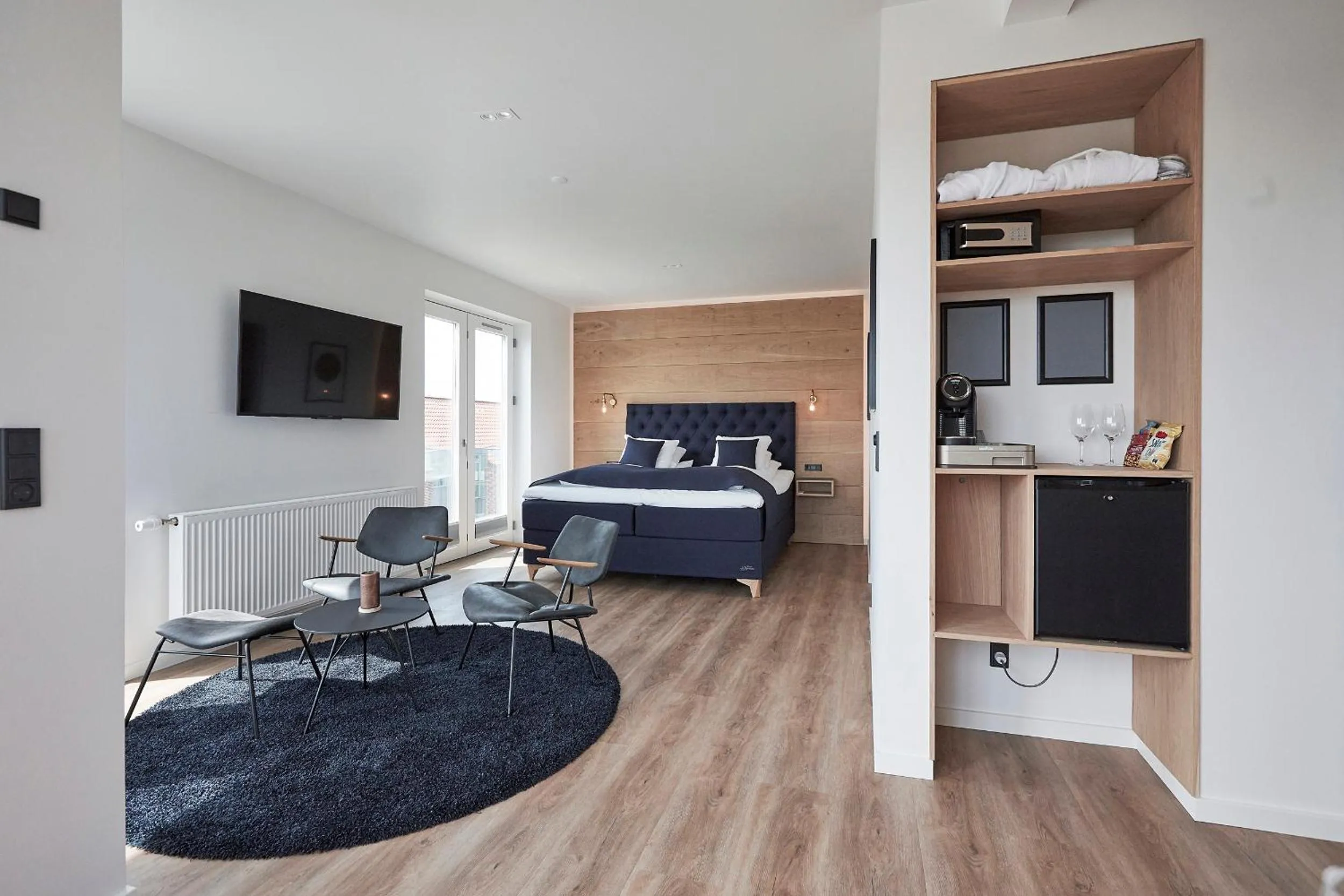 Living room, Bed in Hotel Skjern