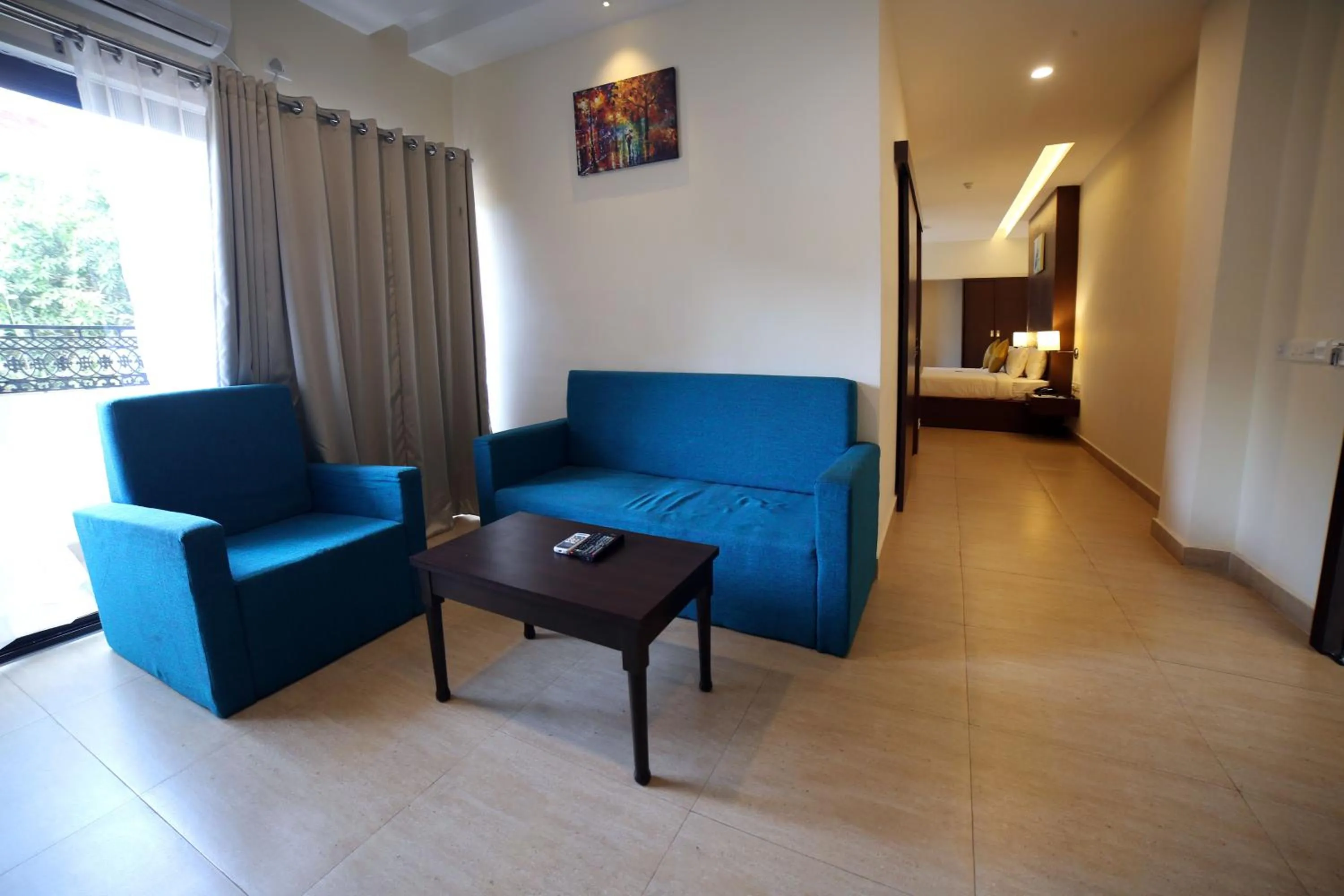 Living room, Bed in Hotel Yamuna