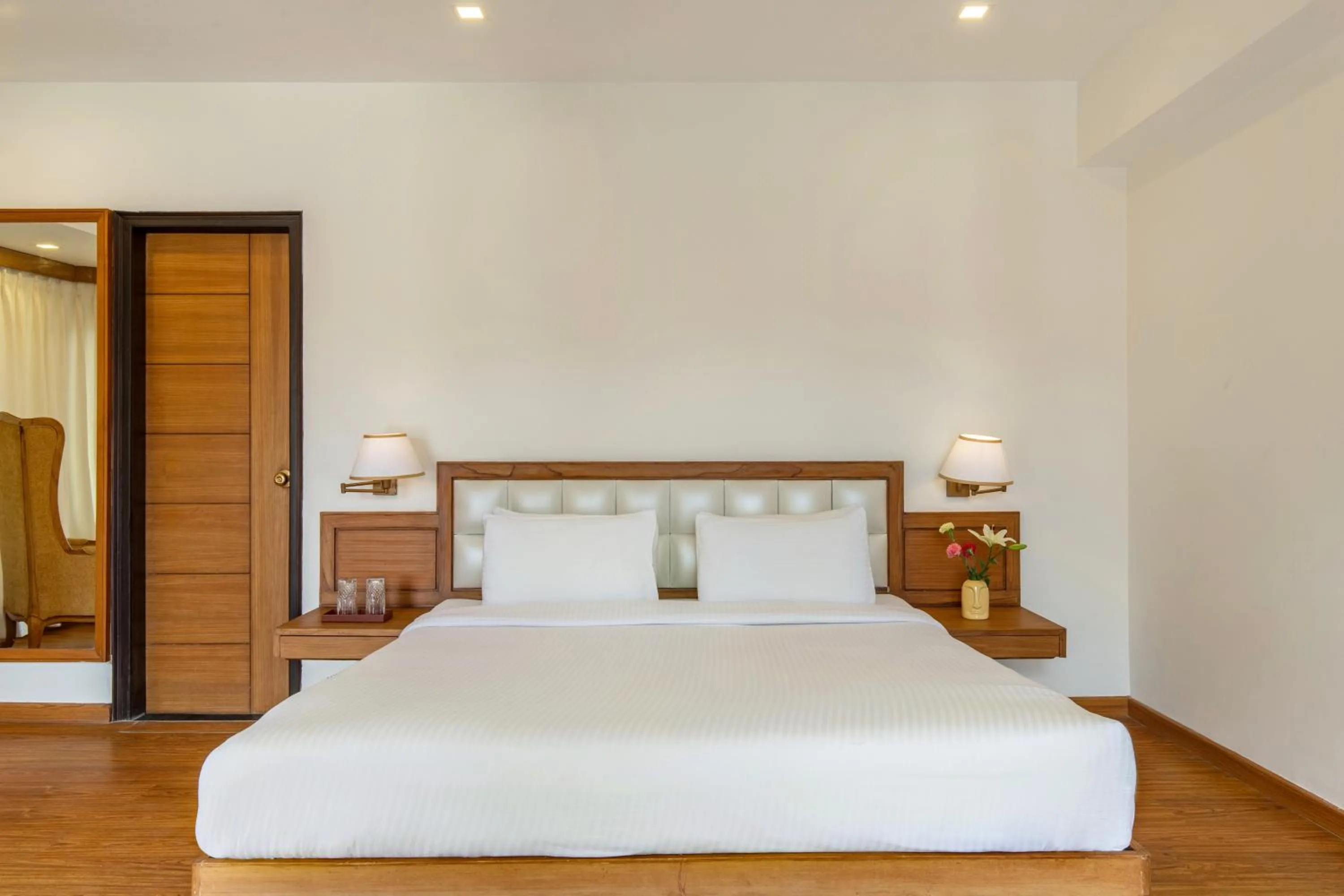 Bedroom, Bed in Country Inn Premier Pacific Mall Road Mussoorie
