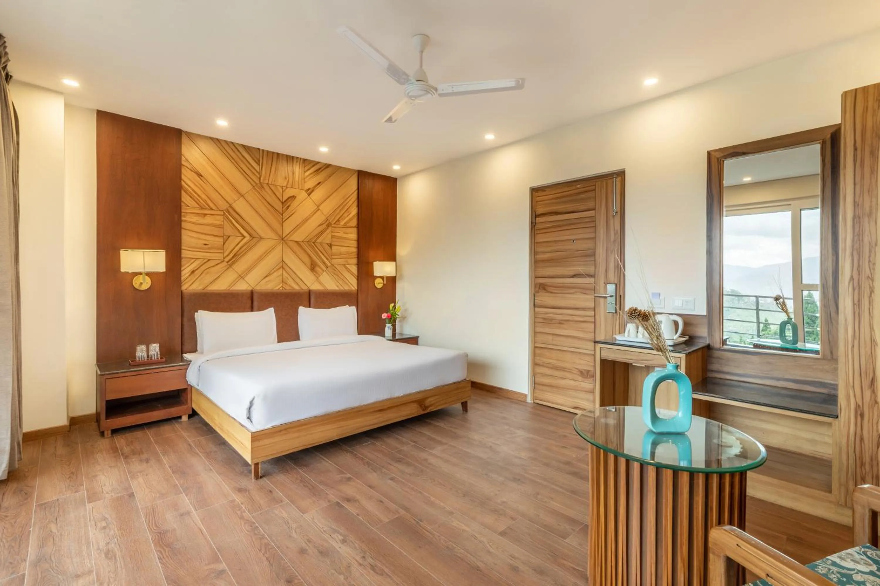 Bedroom, Bed in Country Inn Premier Pacific Mall Road Mussoorie