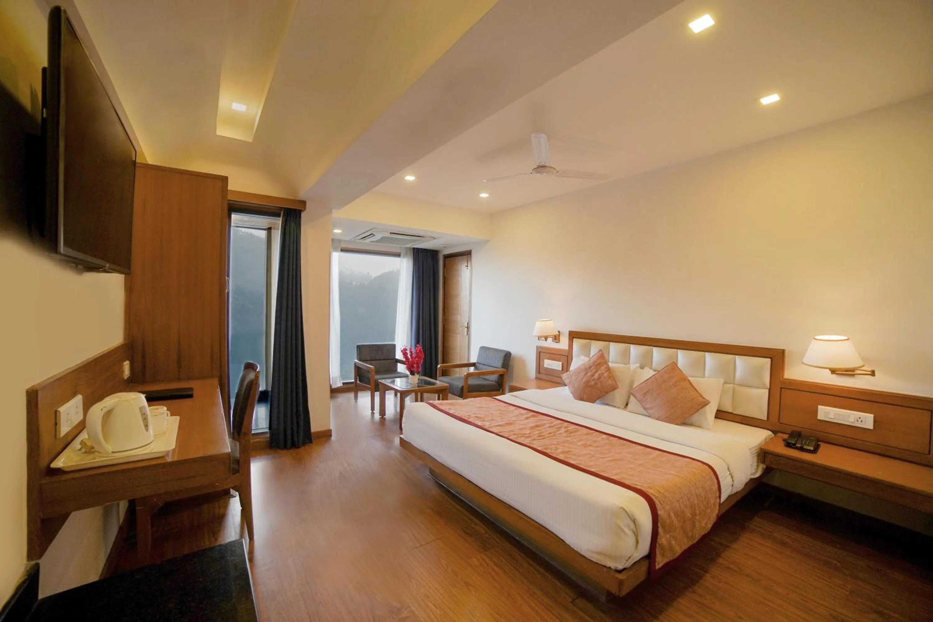 View (from property/room), Bed in Country Inn Premier Pacific Mall Road Mussoorie