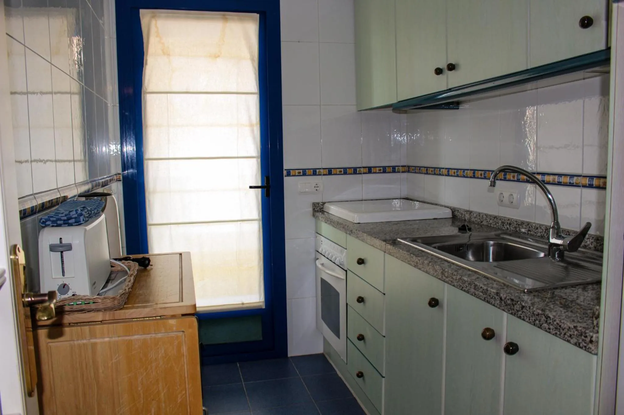 Kitchen or kitchenette in Turquesa Beach Unitursa