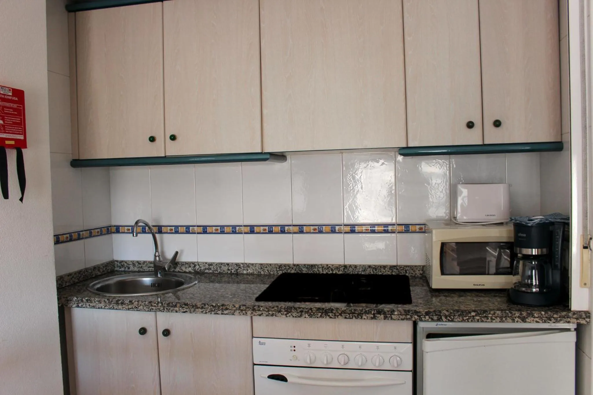 Kitchen or kitchenette in Turquesa Beach Unitursa