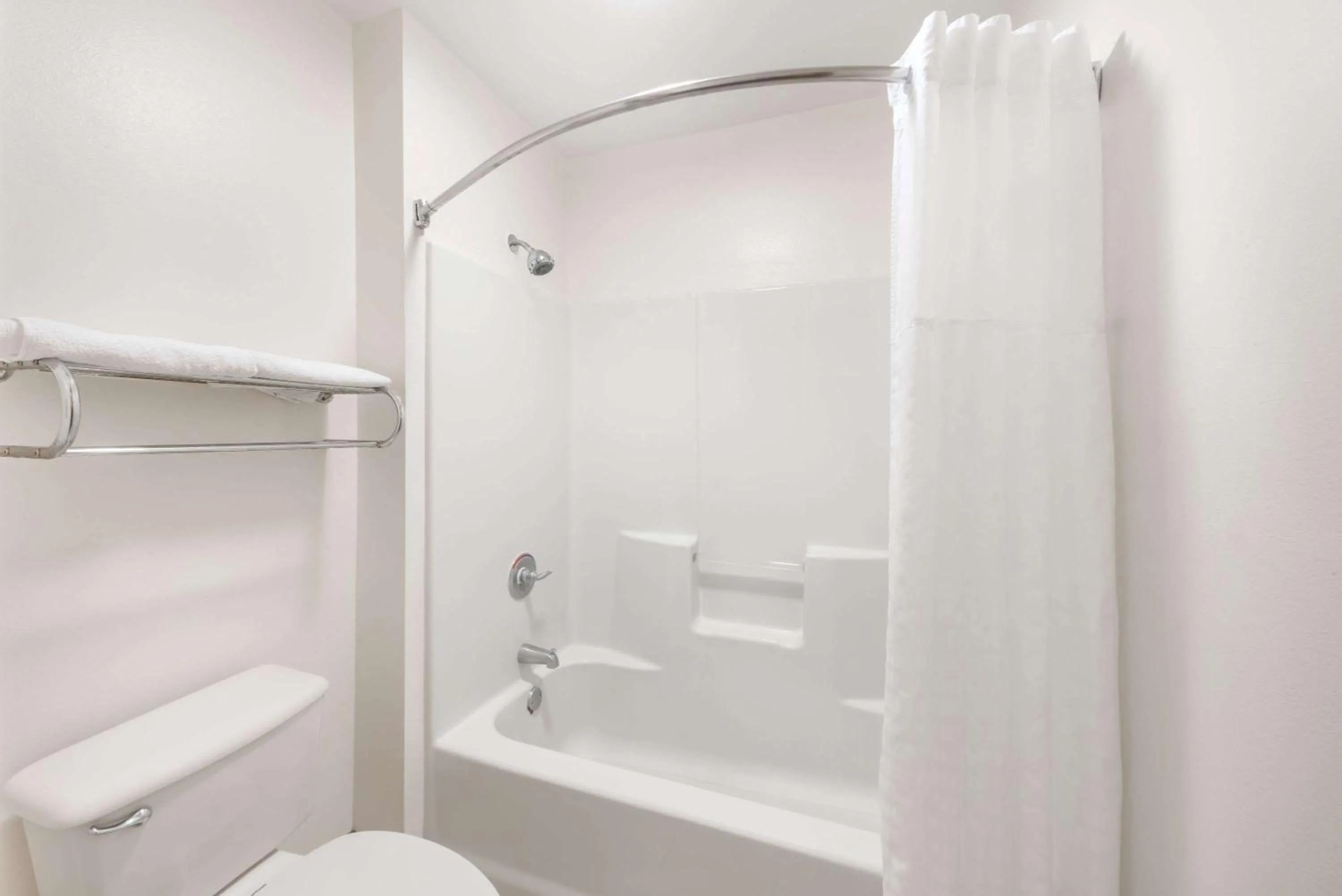 Bathroom in Super 8 by Wyndham Weslaco