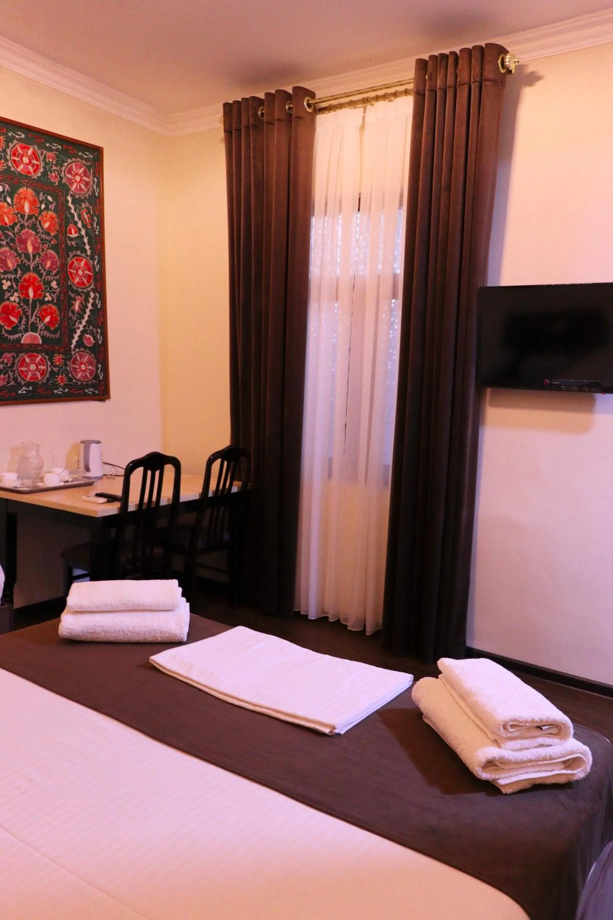 Bed in Al Bukhari Boutique Hotel