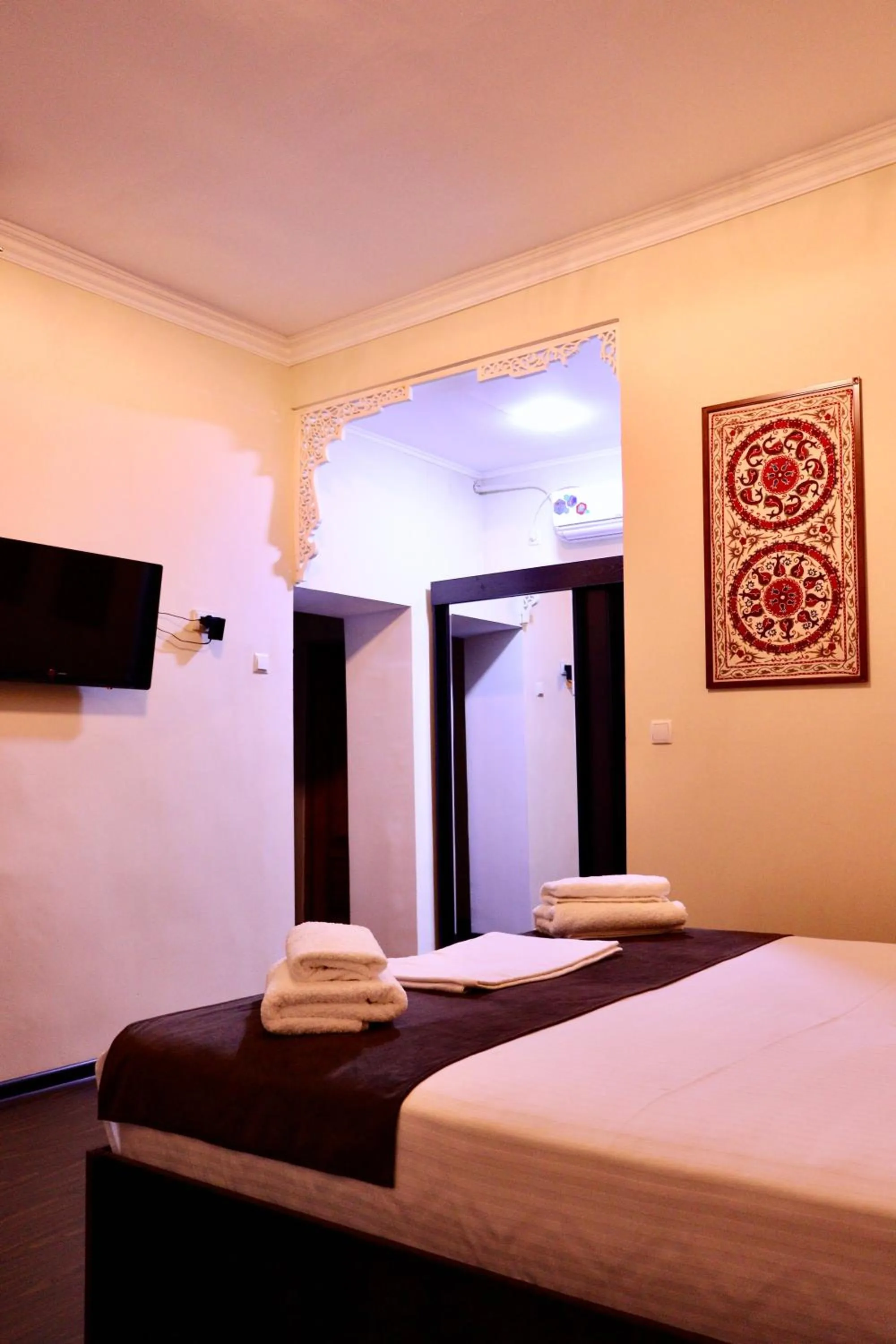 Bed in Al Bukhari Boutique Hotel