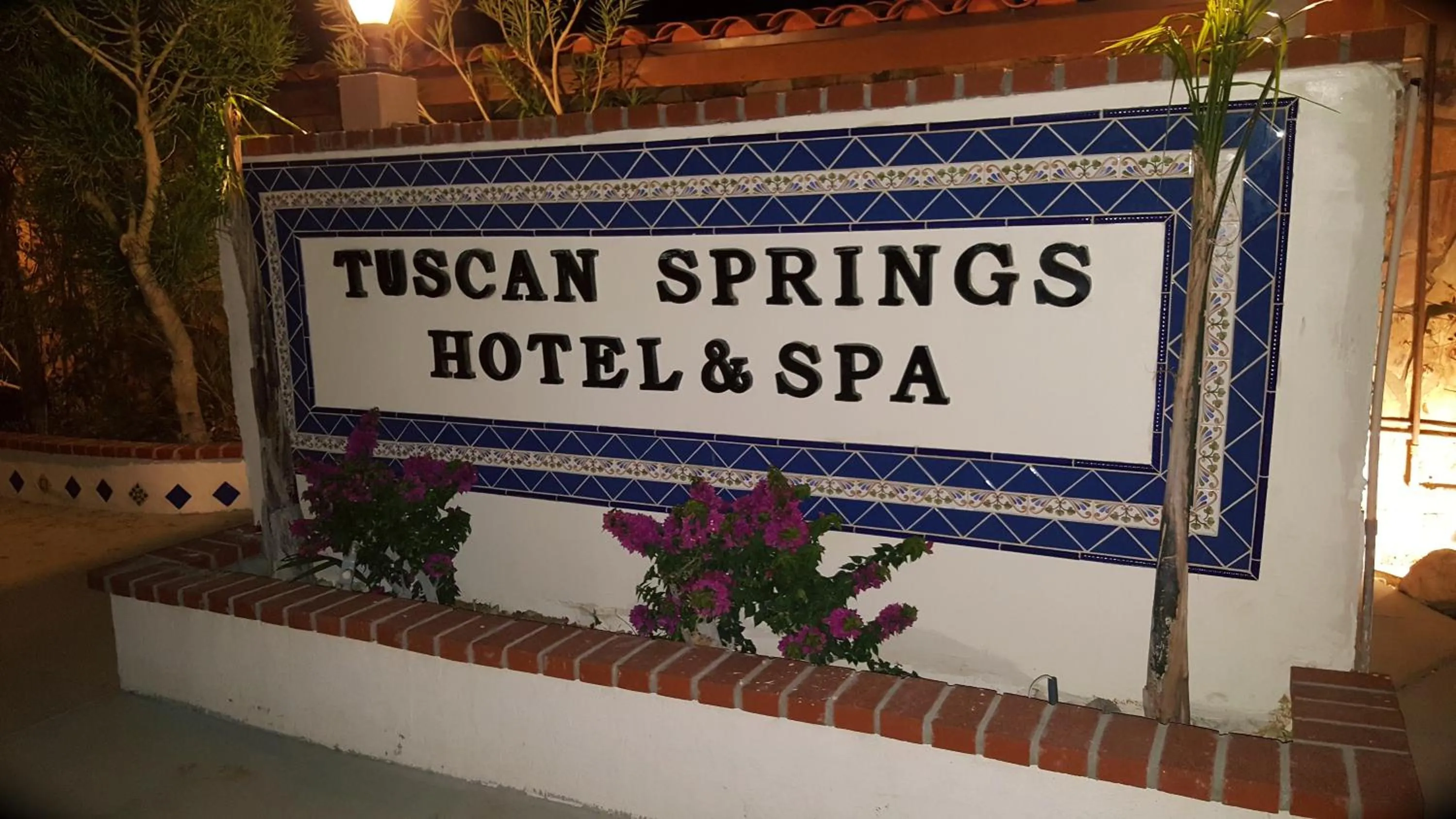 Property logo or sign in Tuscan Springs Hotel & Spa