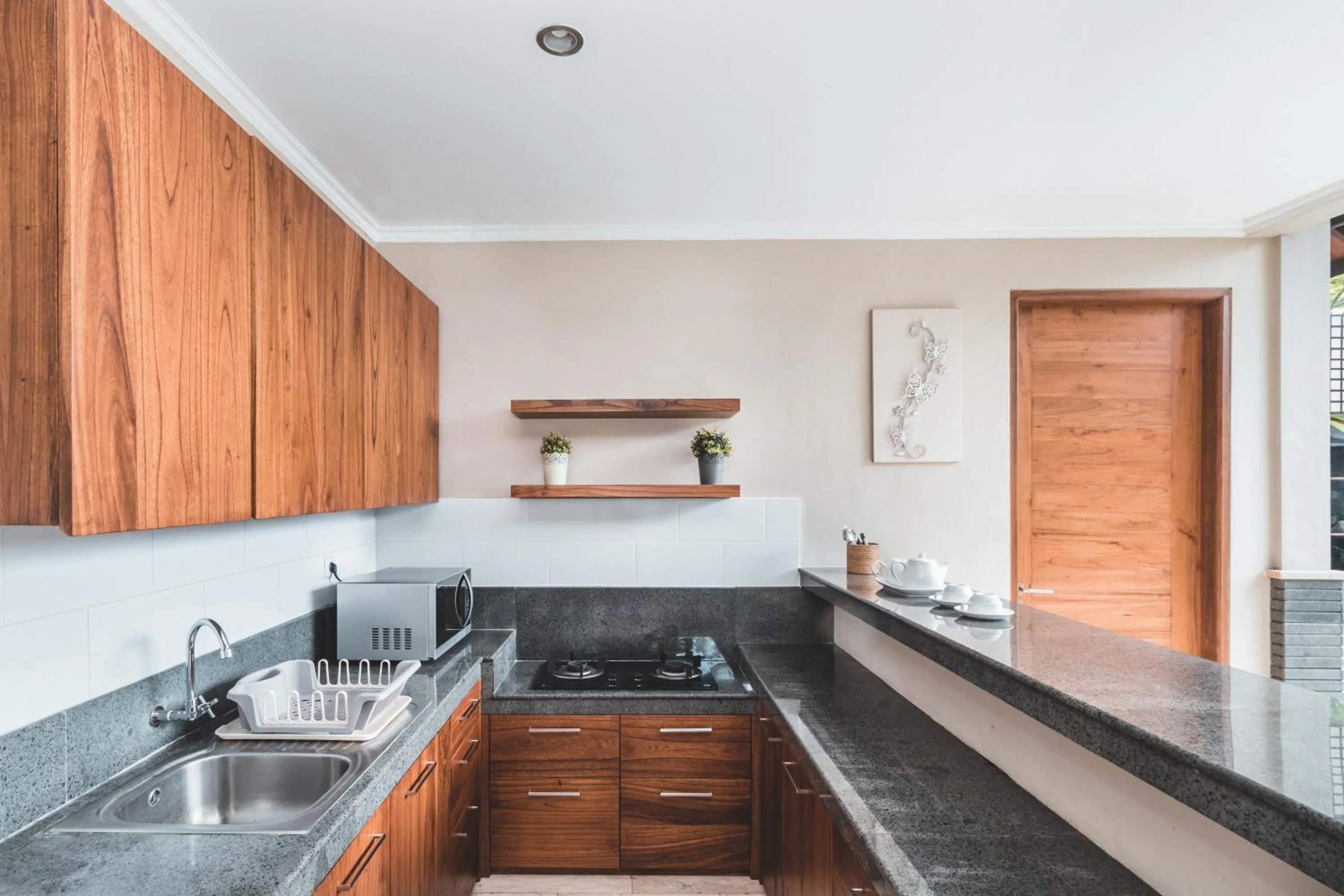 Kitchen or kitchenette in Dura Villas Bali at Kerobokan