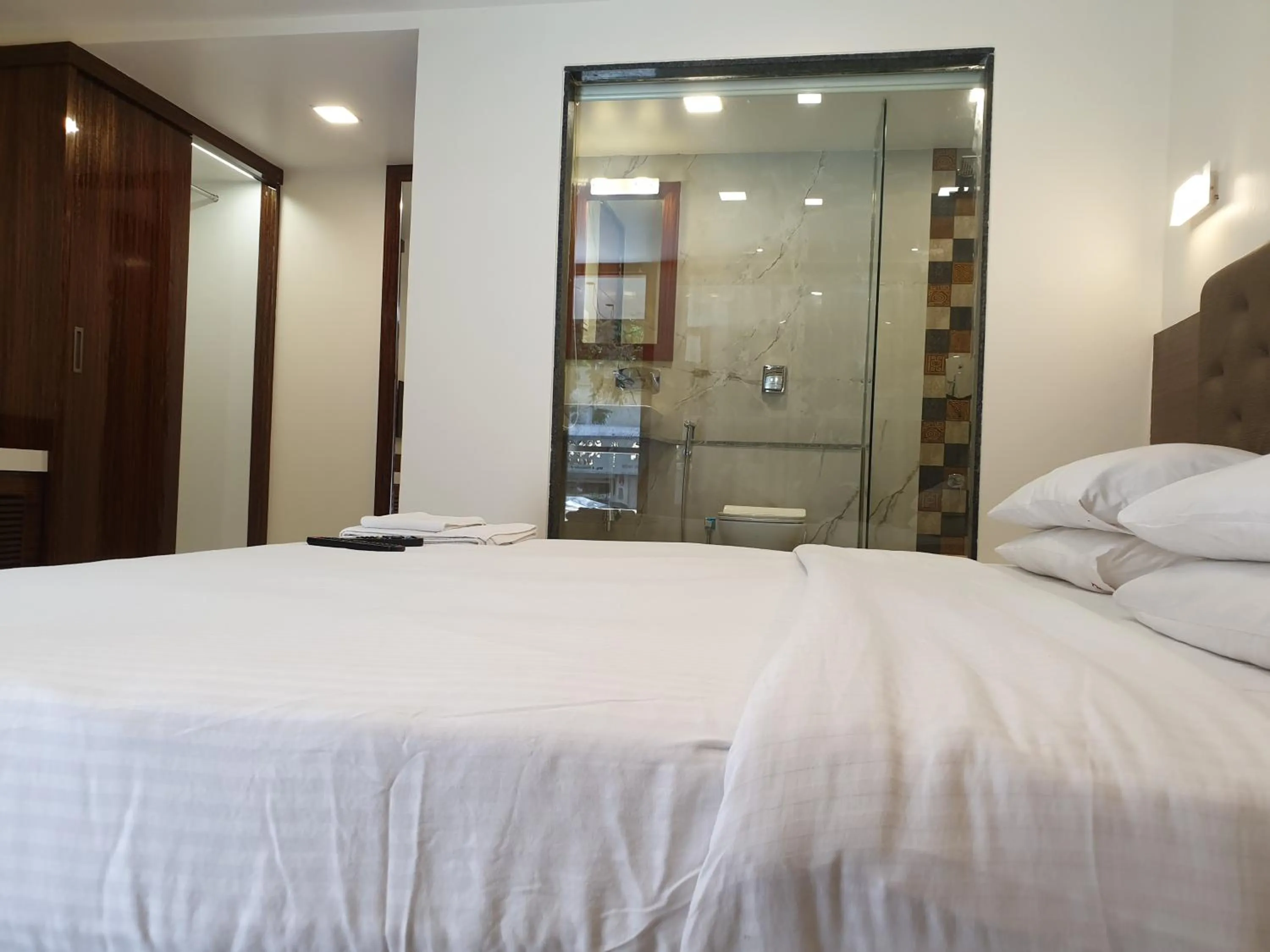 Bed in Hotel Milan International